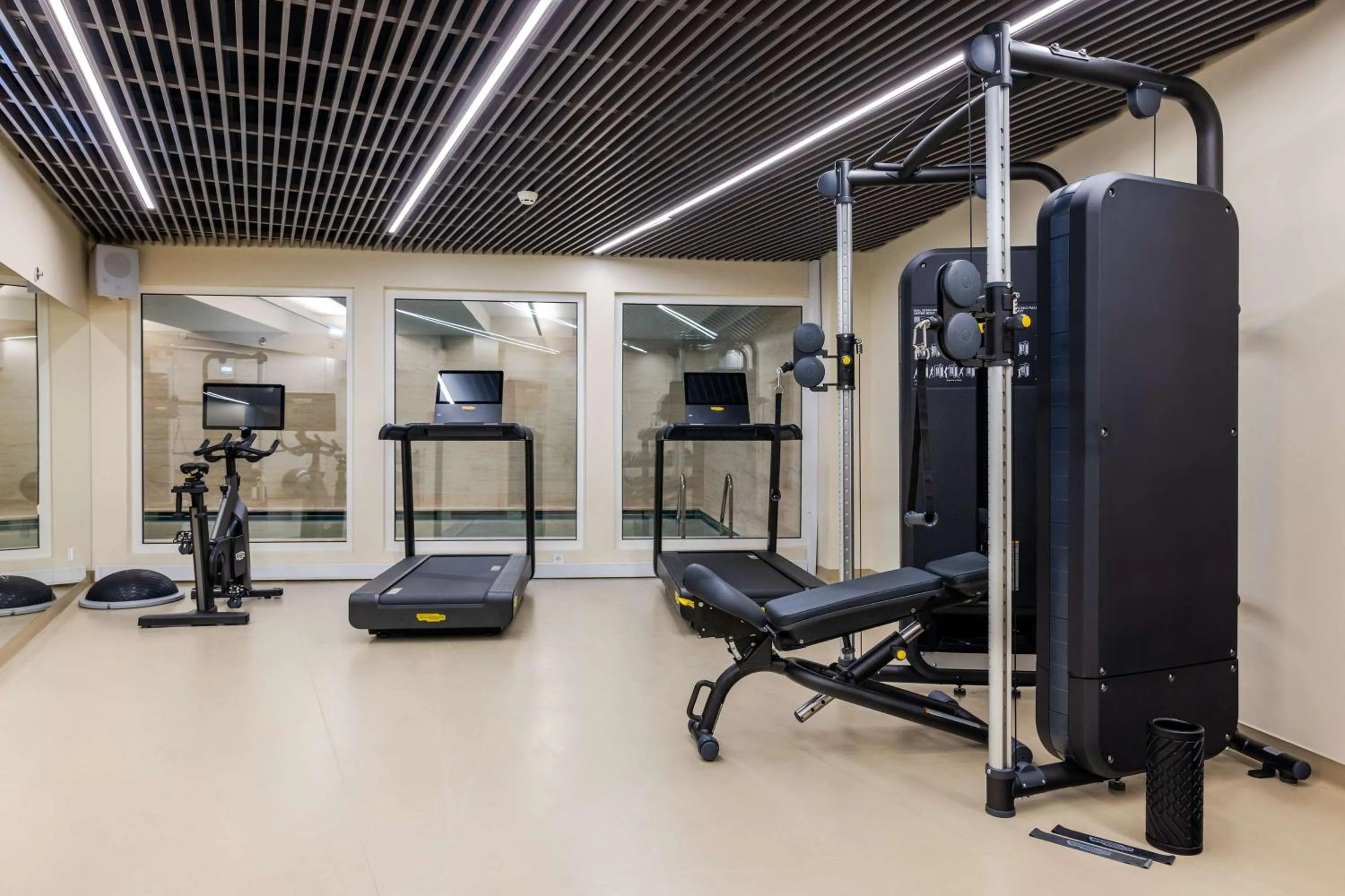Fitness centre/facilities in Cenica Porto Hotel, Curio Collection By Hilton