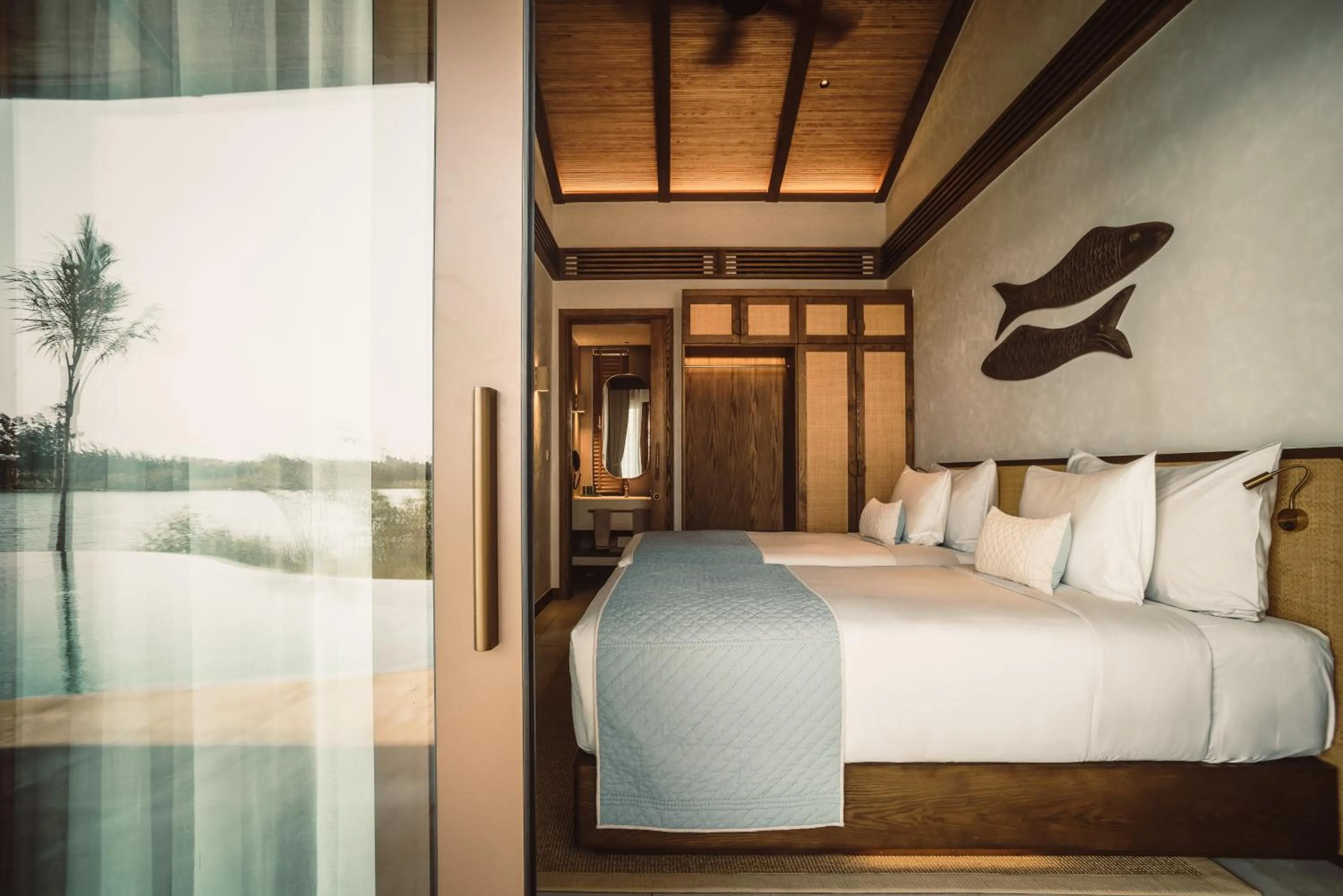 Bed in Namia River Retreat - Wellness Inclusive Resort