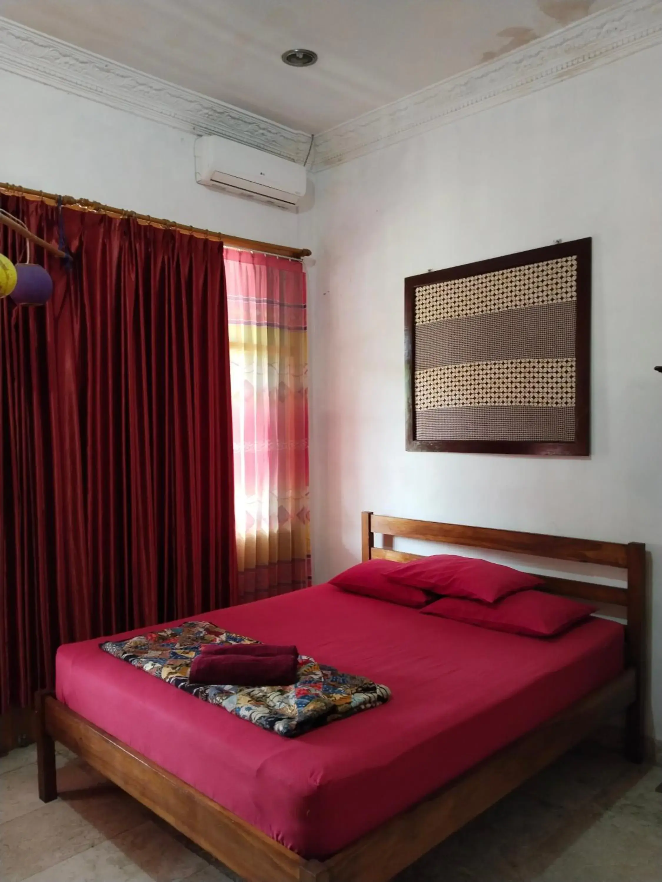 Budget Double Room in Rumah Panjaitan Budget Double Room in Rumah Panjaitan