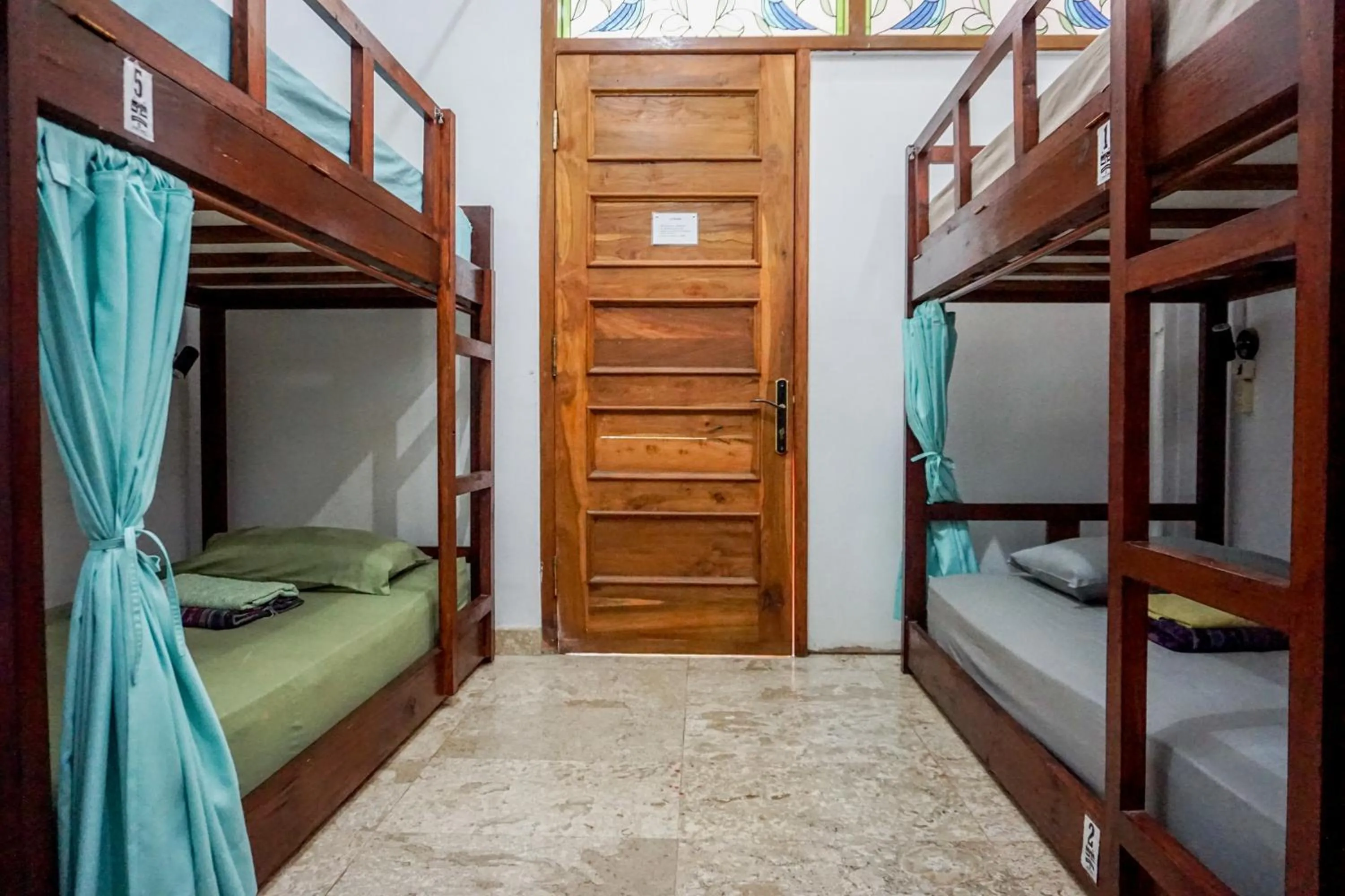 Bed in 6-Bed Female Dormitory Room in Rumah Panjaitan