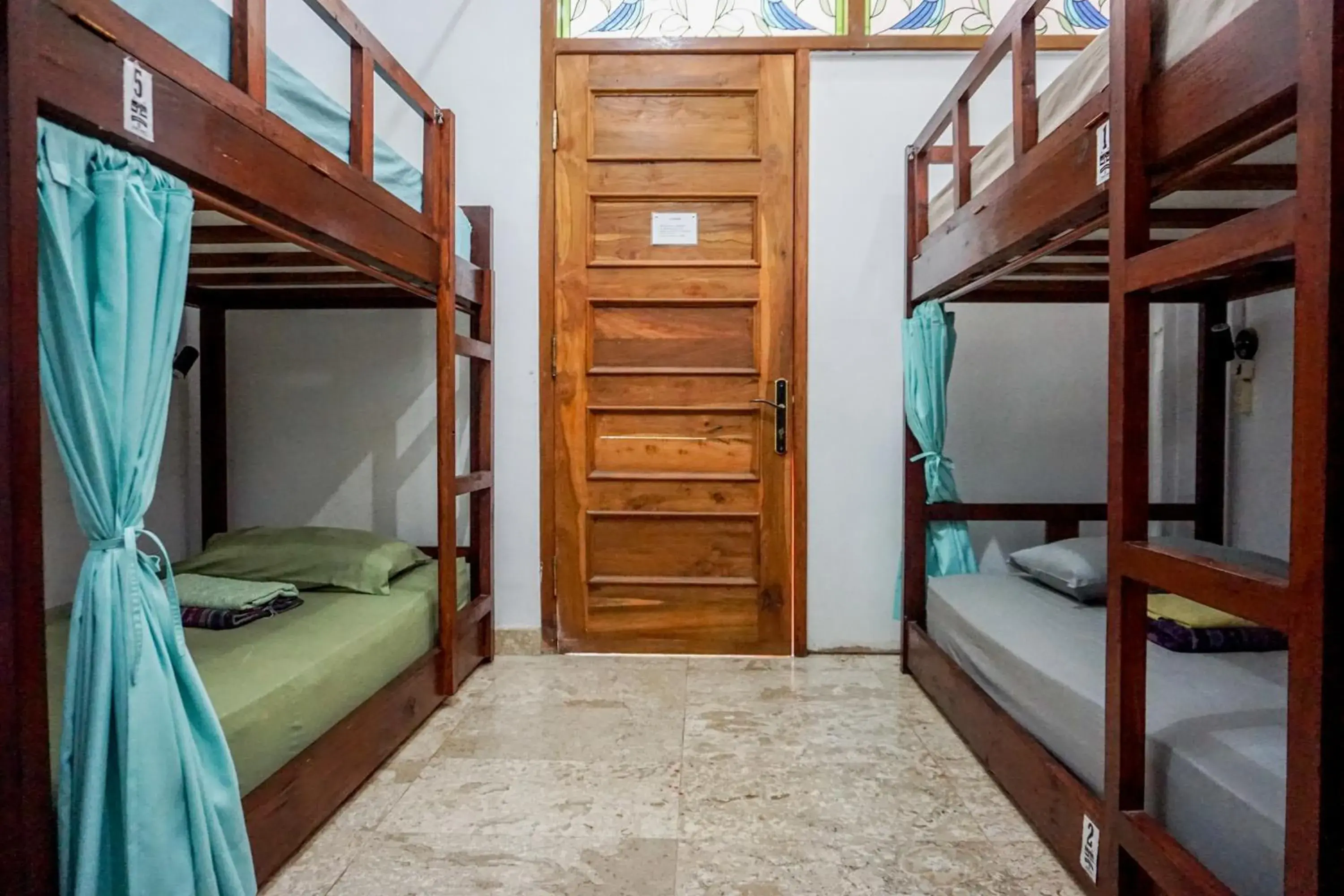 Bed in 6-Bed Female Dormitory Room in Rumah Panjaitan Bed in 6-Bed Female Dormitory Room in Rumah Panjaitan