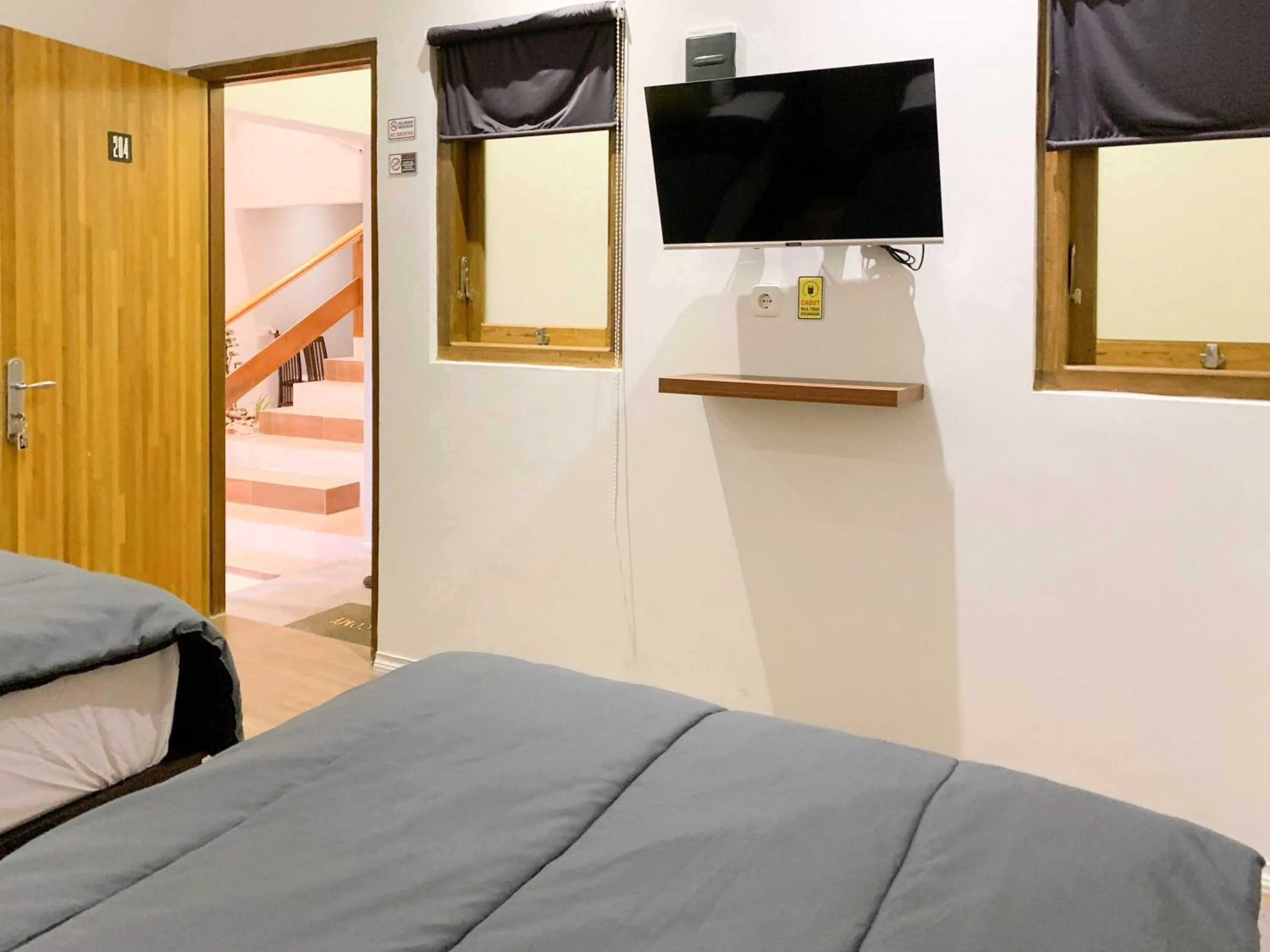 Bed in Urbanview House of IKIGAI