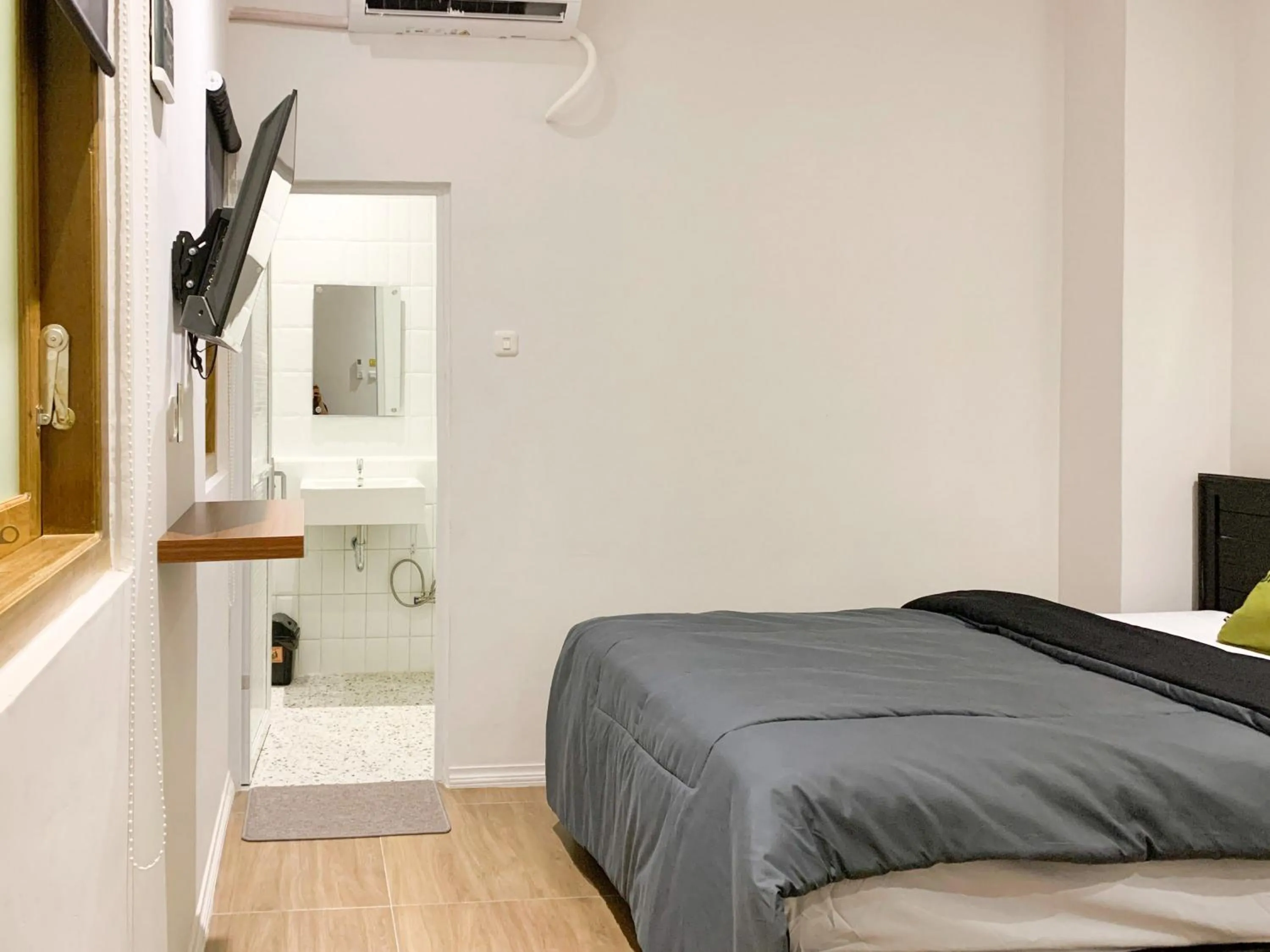 Bed in Urbanview House of IKIGAI