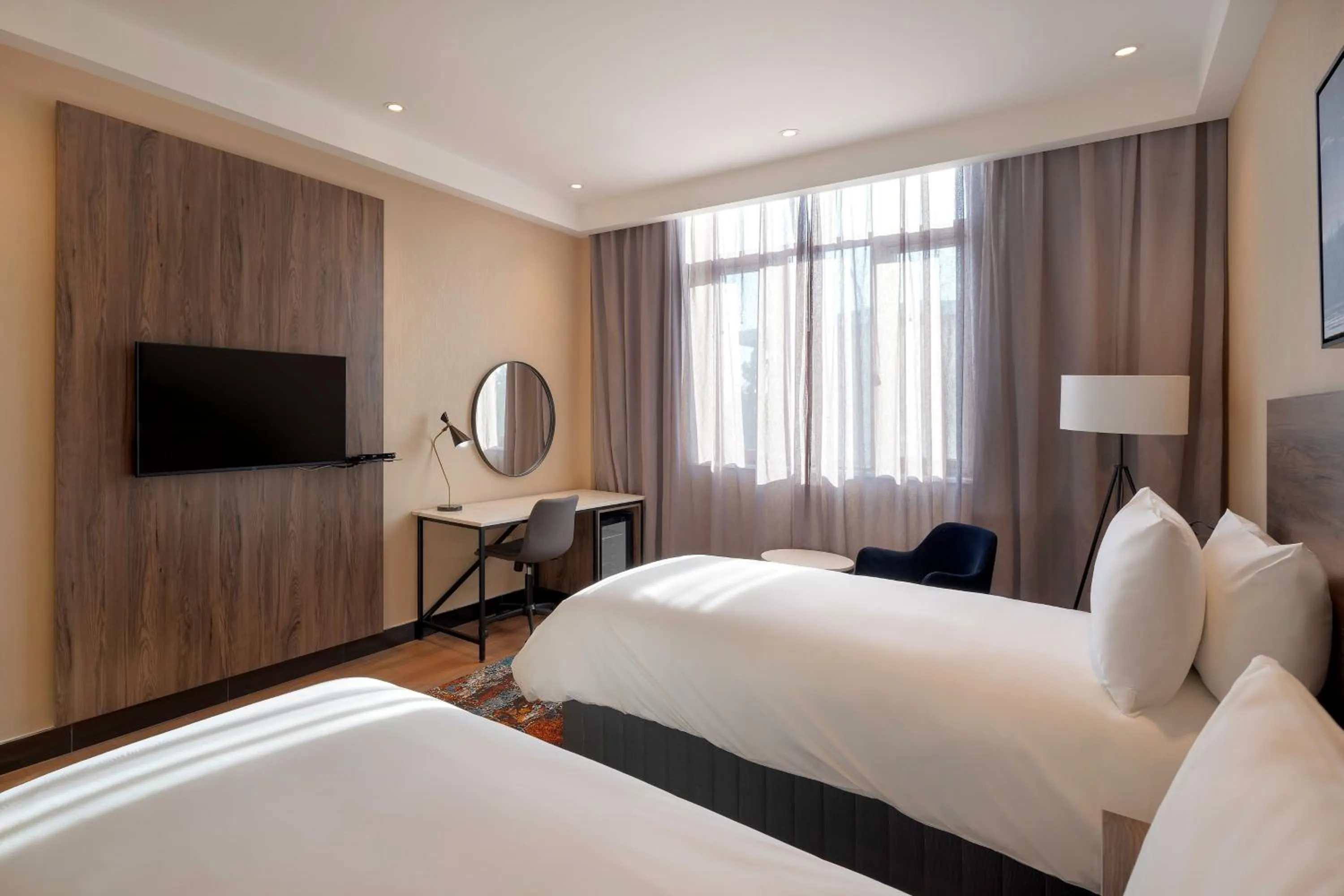 Photo of the whole room, Bed in Protea Hotel by Marriott Lusaka International Airport