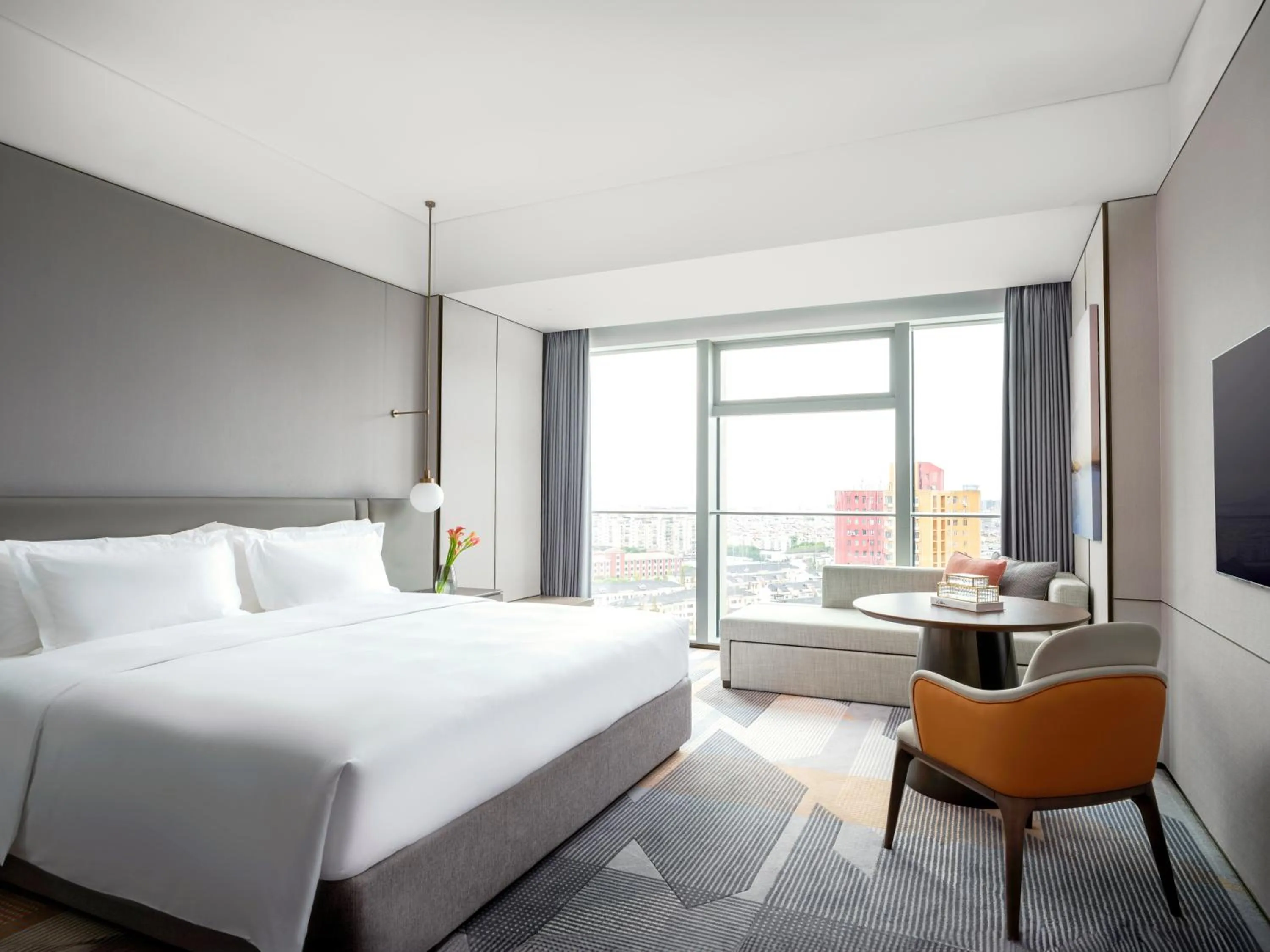Photo of the whole room, Bed in Cordis Shanghai Seaworld