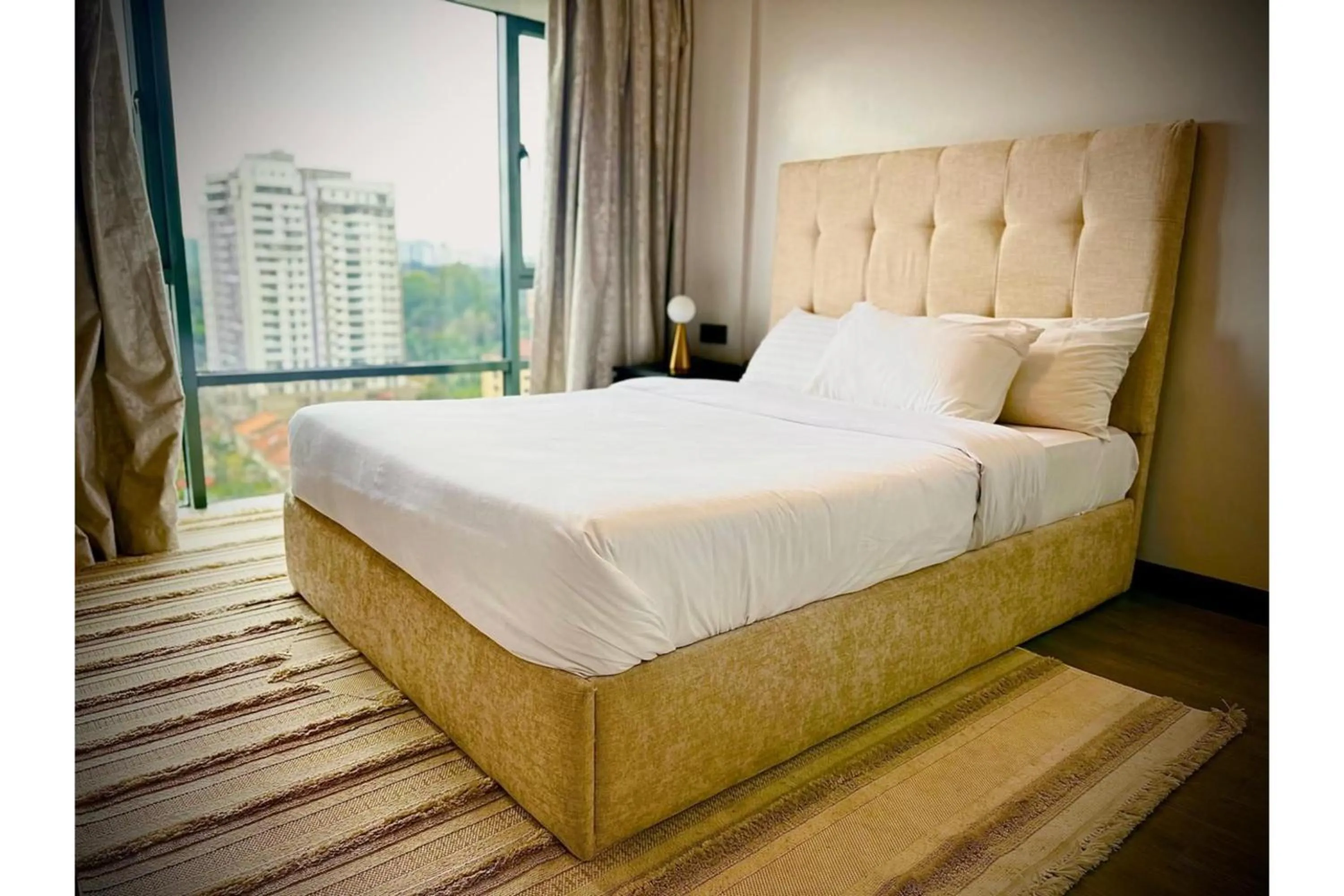 Bed in Escada Serviced Apartments