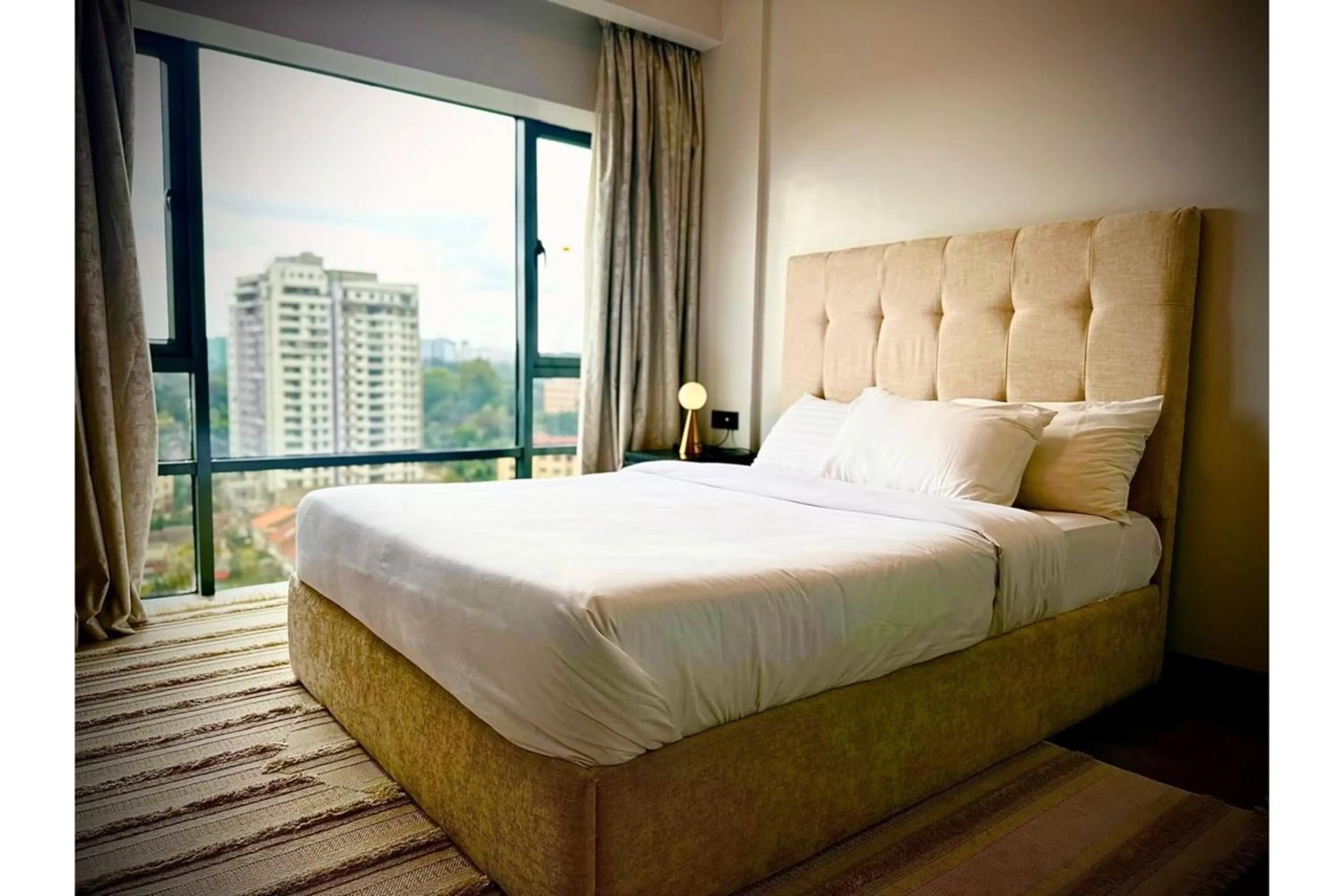 Bed in Escada Serviced Apartments