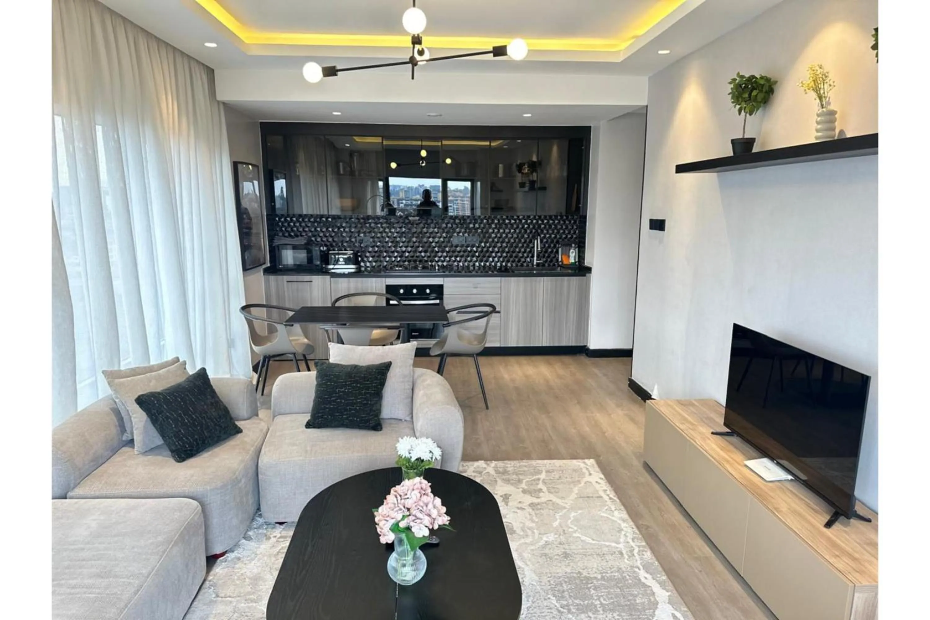 TV and multimedia in Escada Serviced Apartments