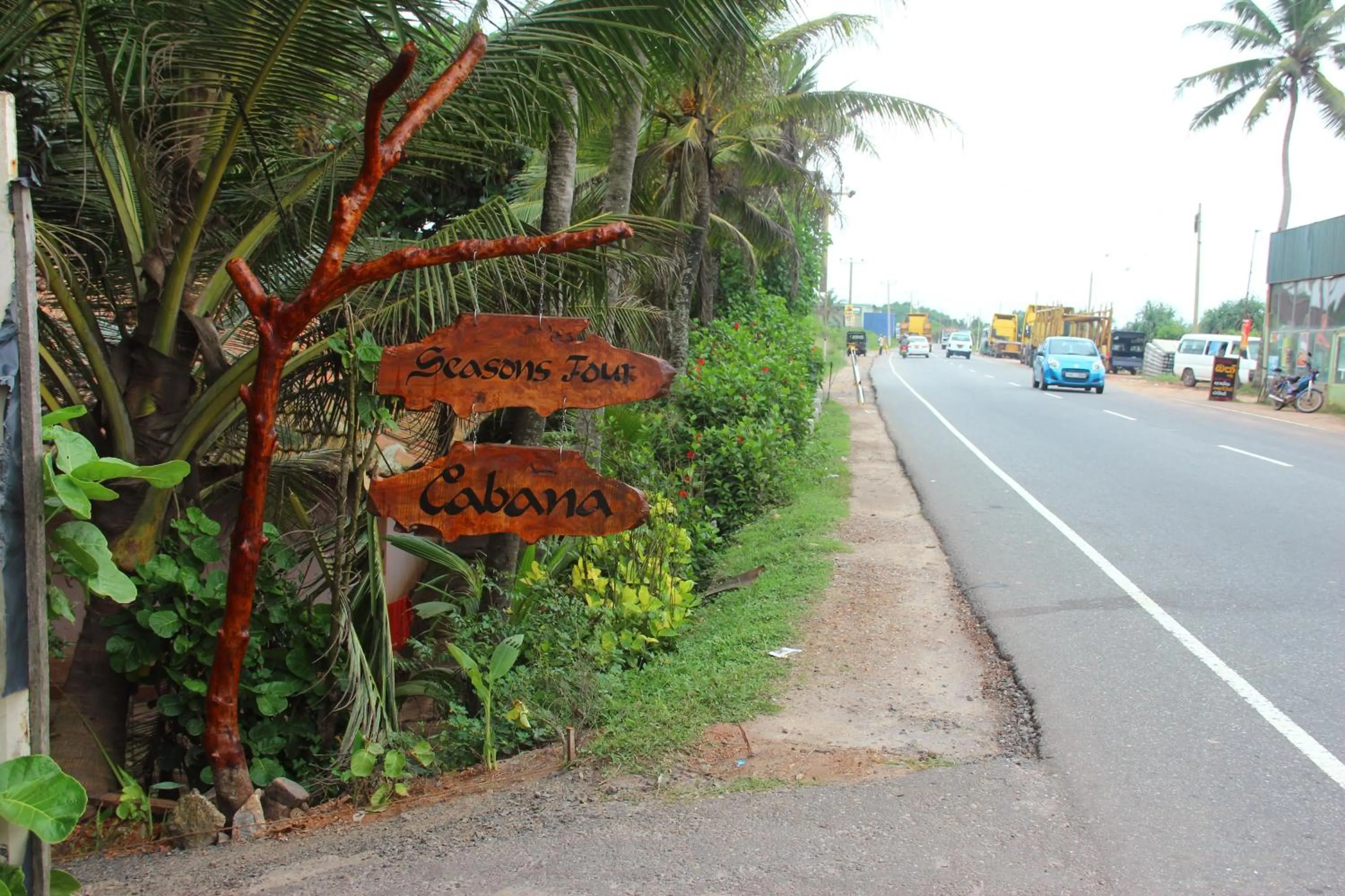 Property logo or sign in Seasons Four Mini Jungle Cabana