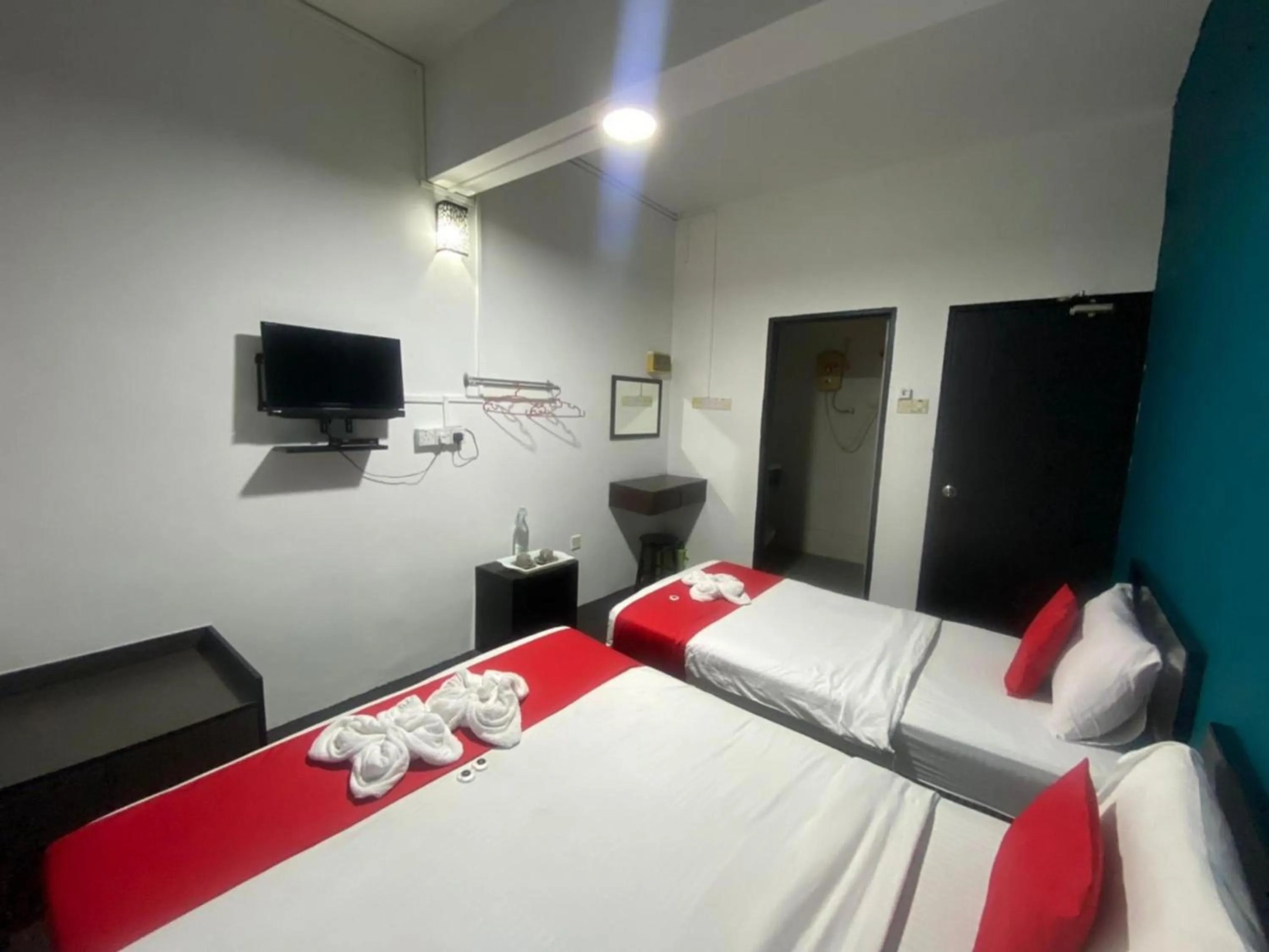 Bedroom in Hotel O Captain Hotel Cafe & Bistro