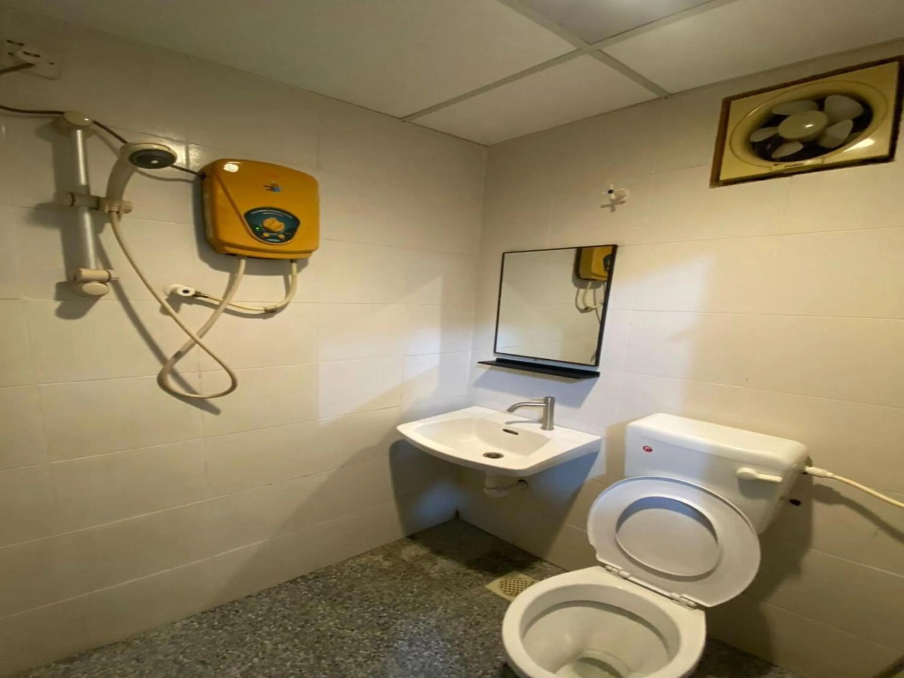 Bathroom in Hotel O Captain Hotel Cafe & Bistro