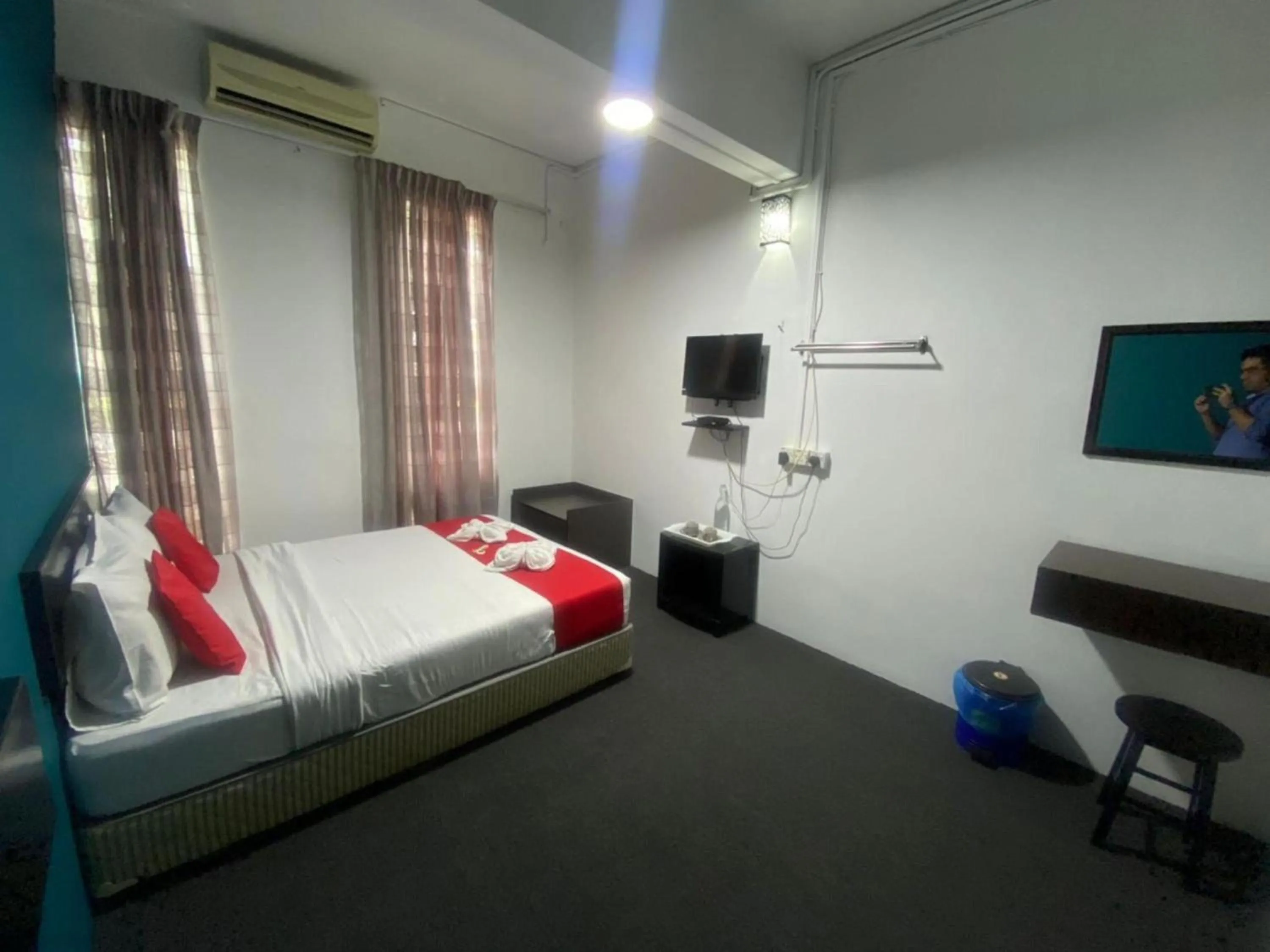 Bedroom in Hotel O Captain Hotel Cafe & Bistro