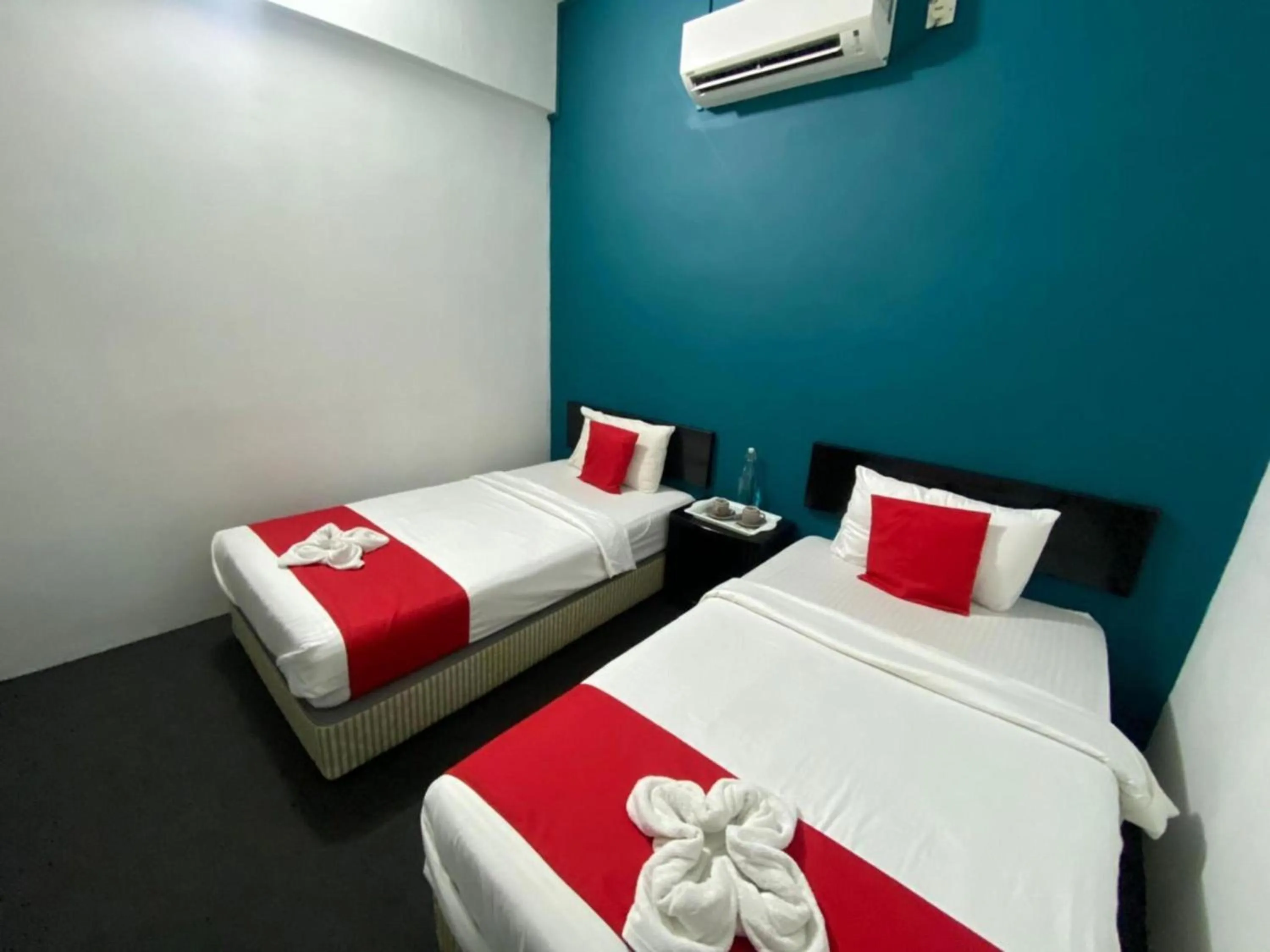 Bedroom in Hotel O Captain Hotel Cafe & Bistro