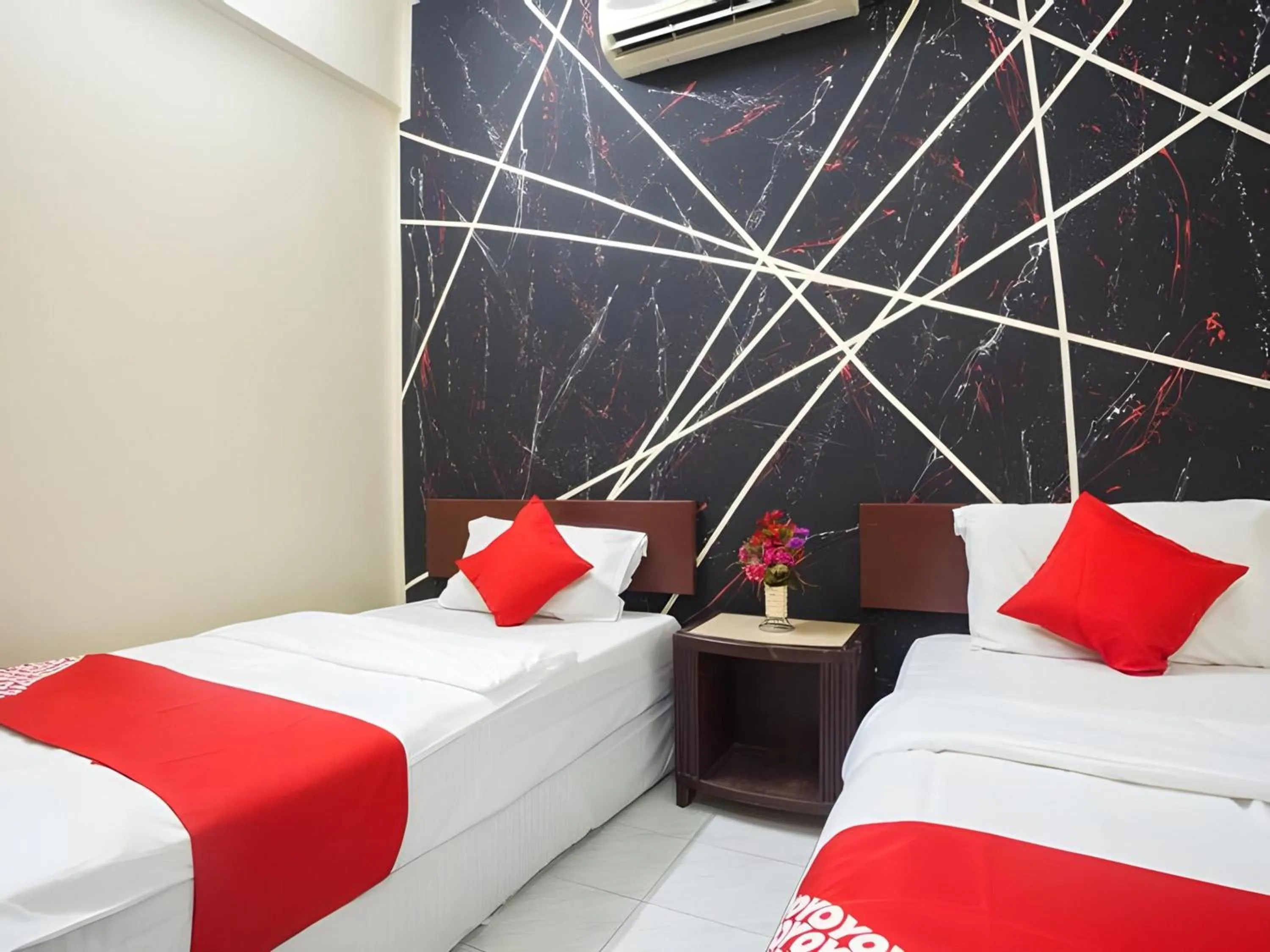 Bedroom in Hotel O Captain Hotel Cafe & Bistro