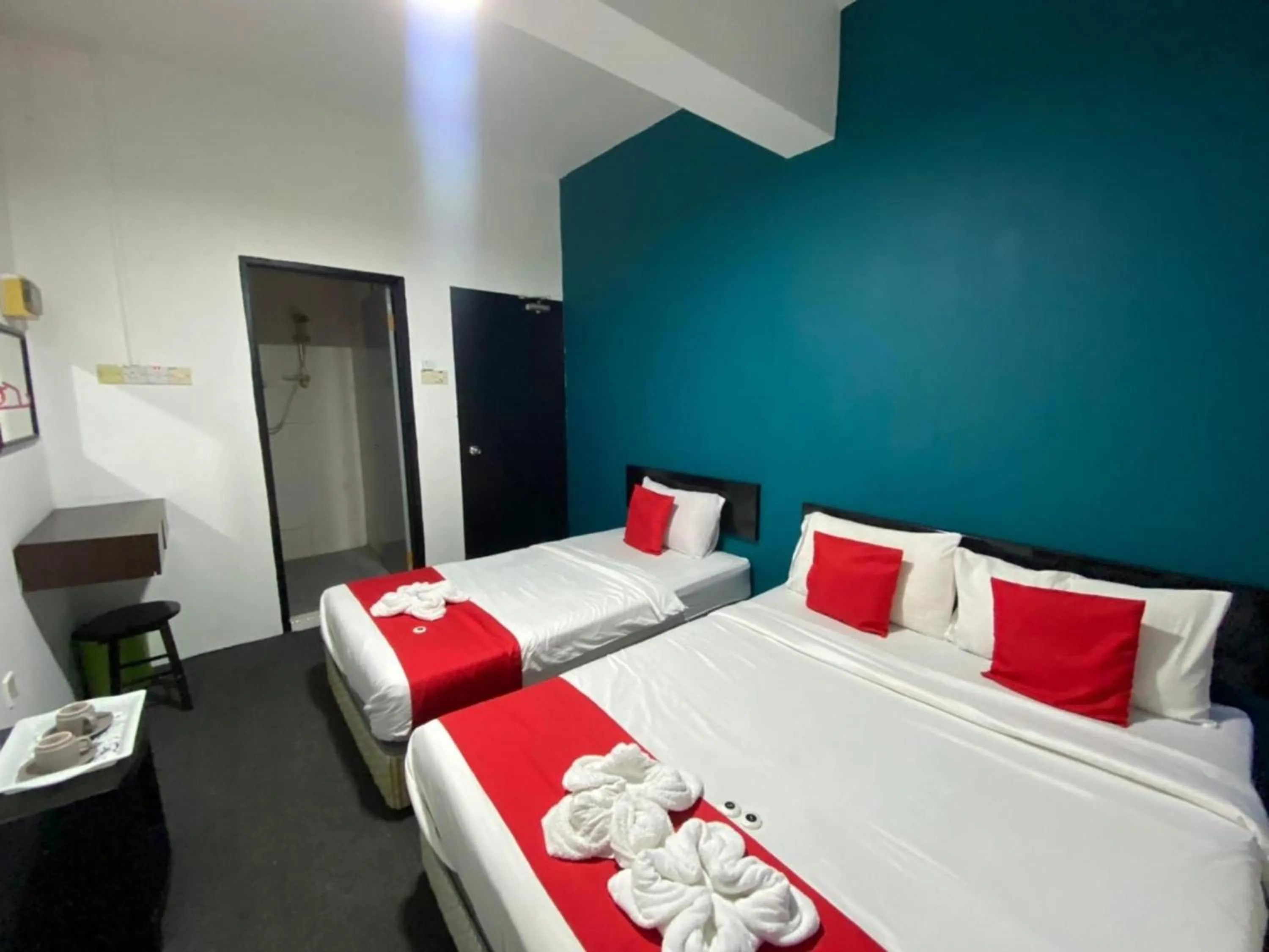 Bedroom in Hotel O Captain Hotel Cafe & Bistro