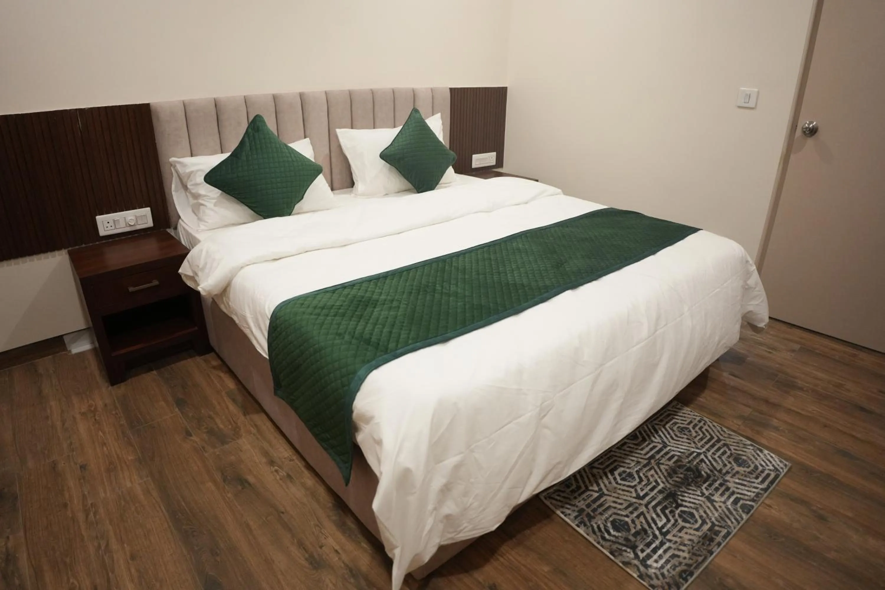 Bed in AK Castle Suites