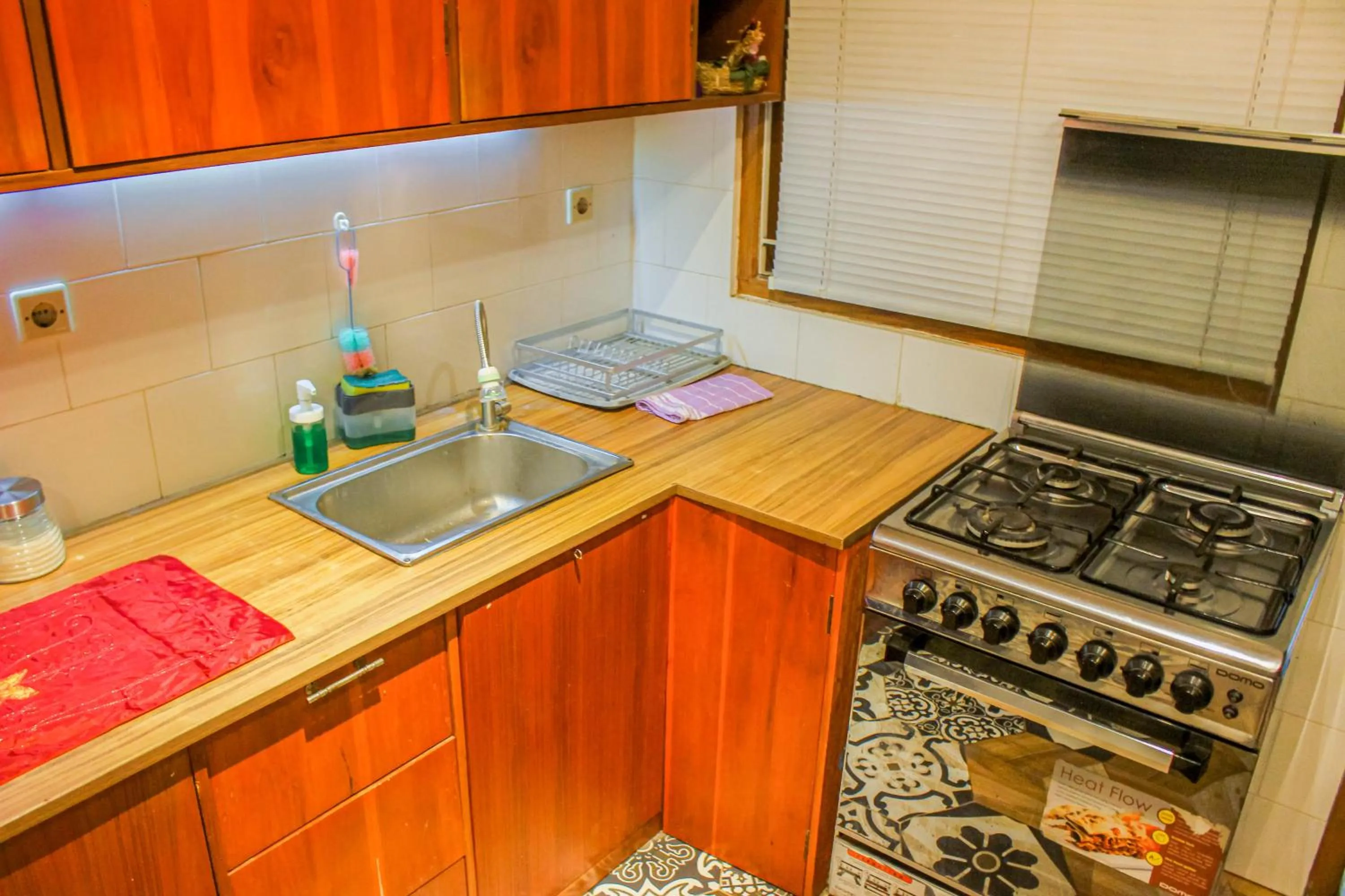 Kitchen or kitchenette in Villa D'Maguwo Suites