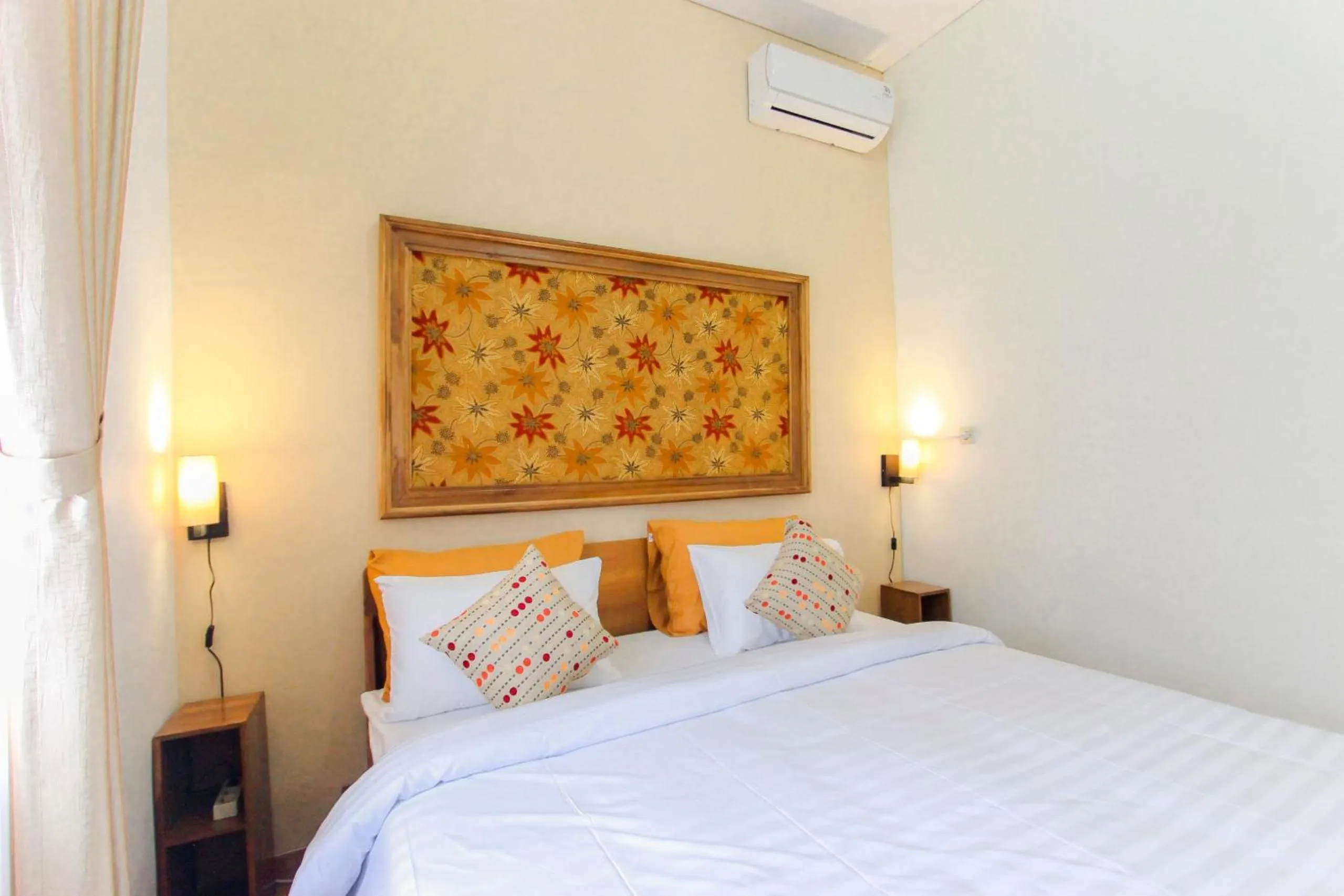 Bed in Villa D'Maguwo Suites