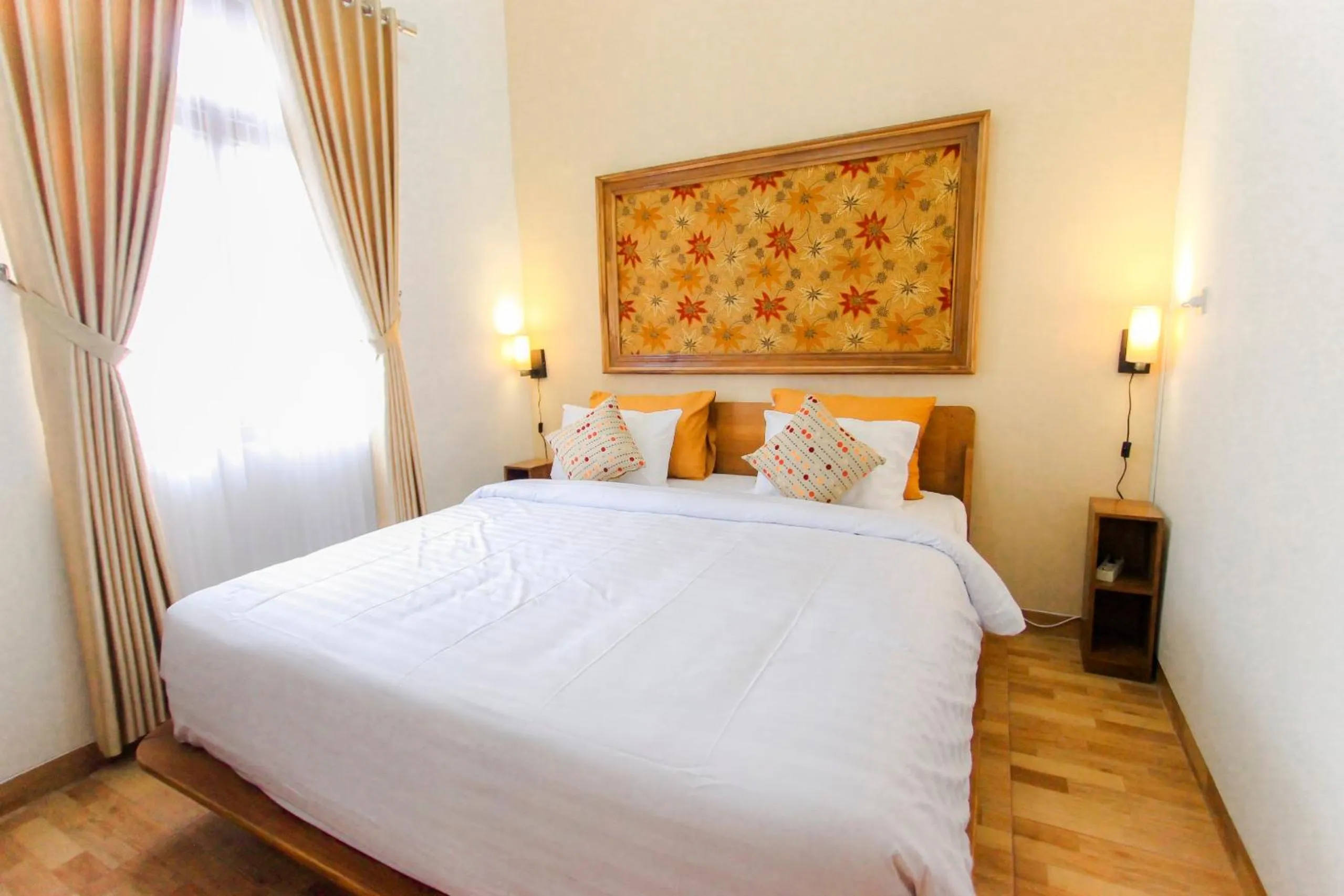 Bed in Villa D'Maguwo Suites