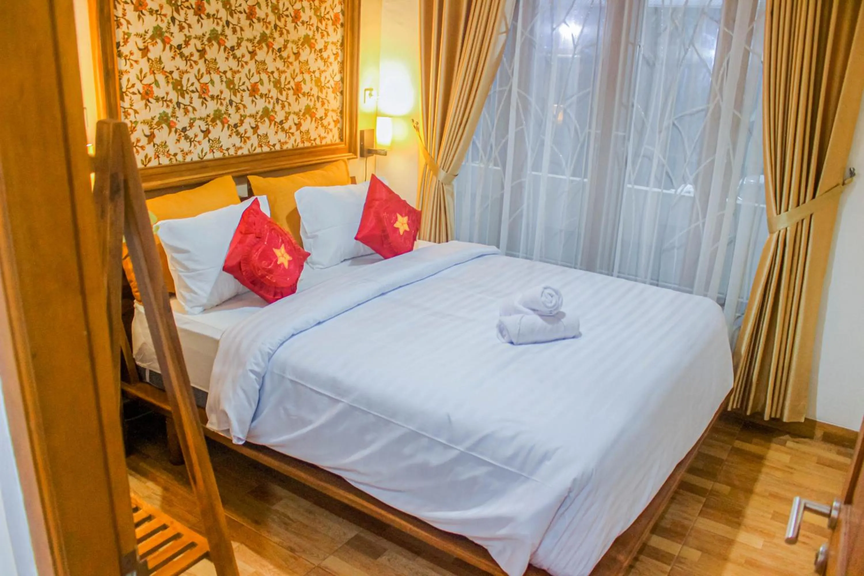 Bed in Villa D'Maguwo Suites