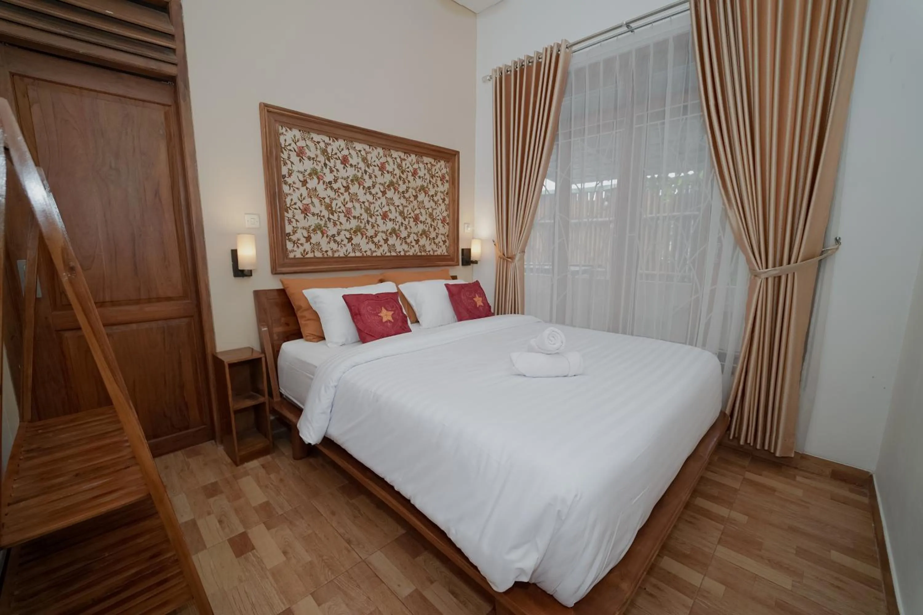 Bed in Villa D'Maguwo Suites