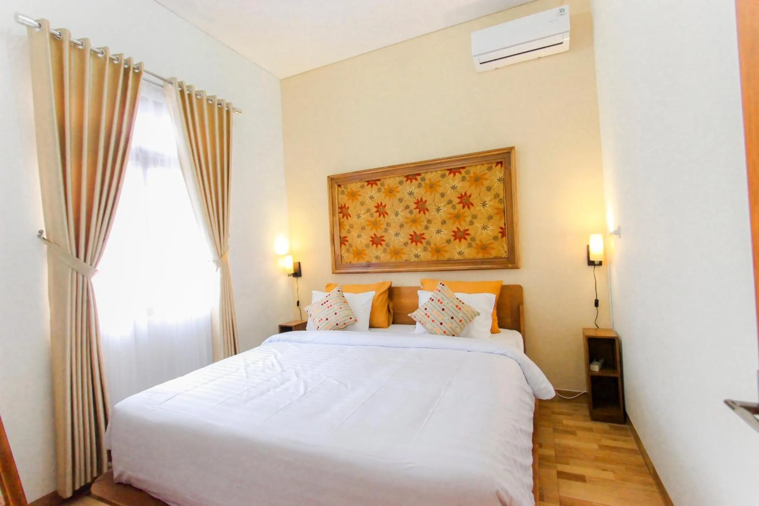 Bed in Villa D'Maguwo Suites
