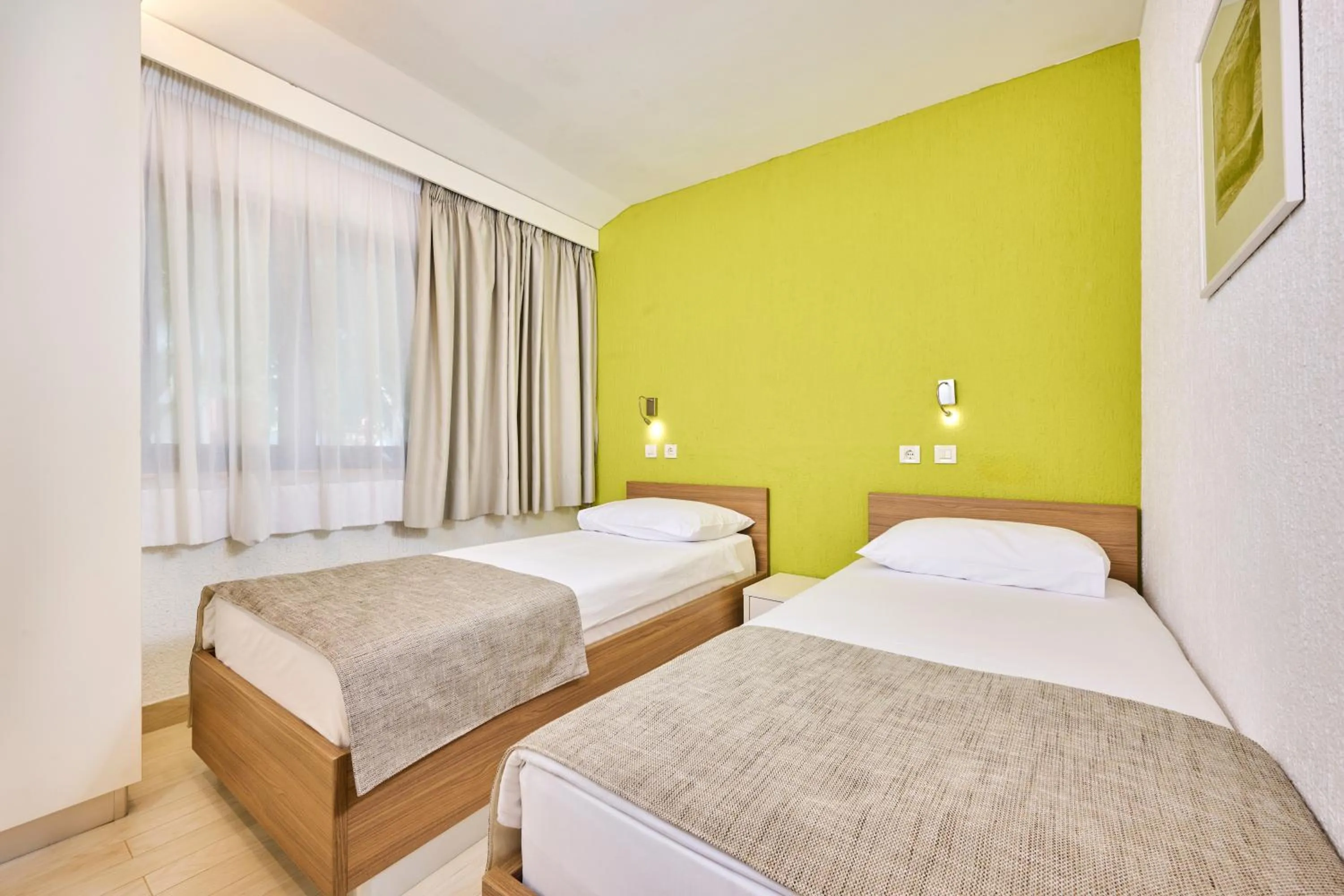 Bed in Apartments Galijot Plava Laguna