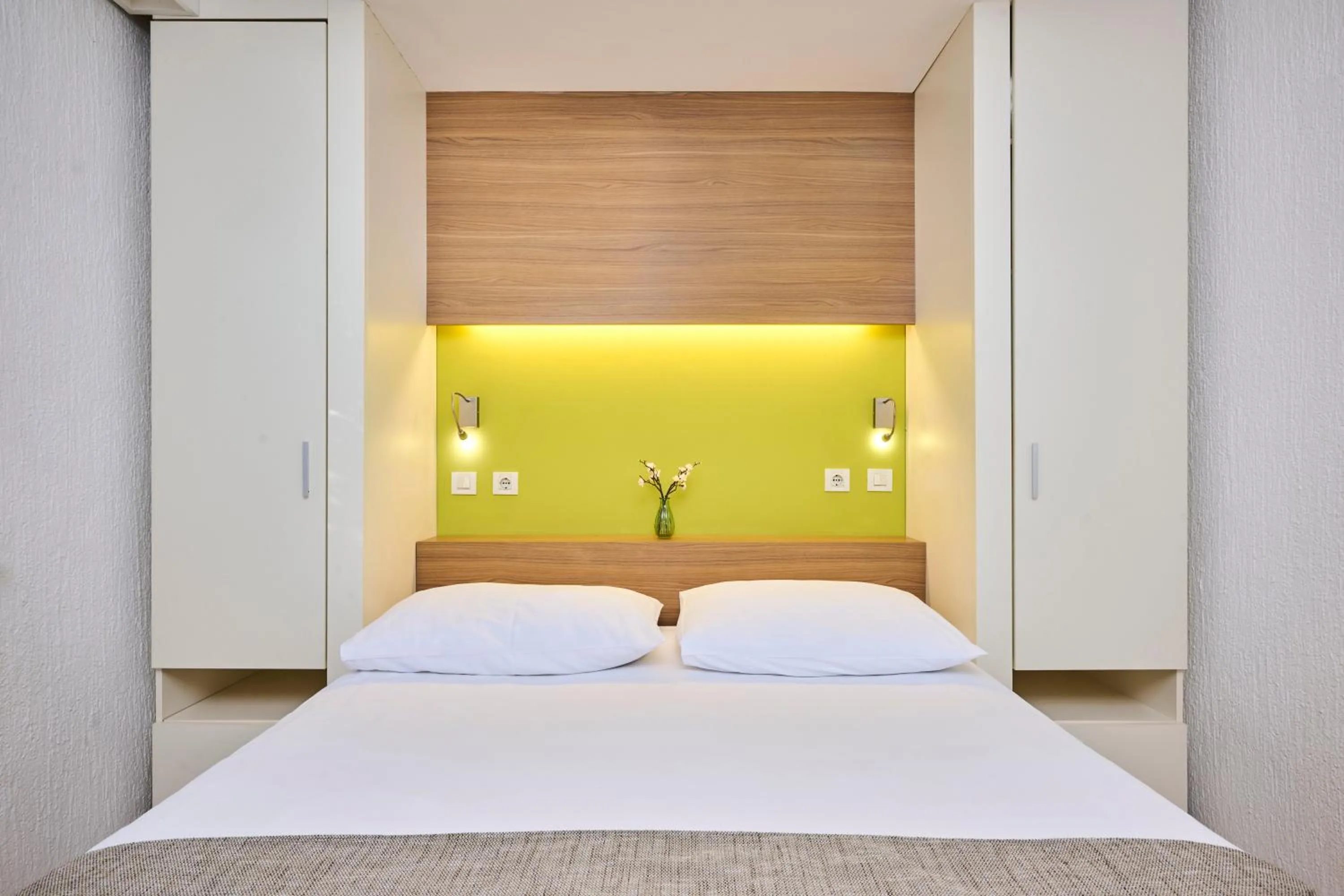 Bed in Apartments Galijot Plava Laguna