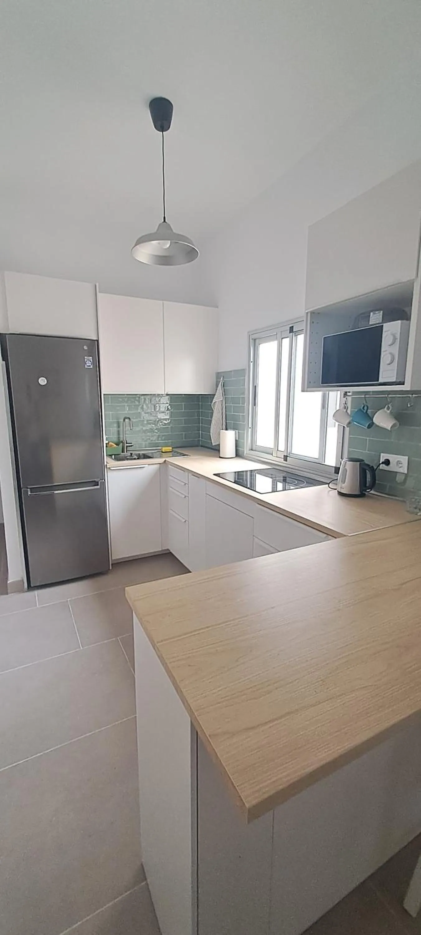 Kitchen or kitchenette in The Wave Temple II
