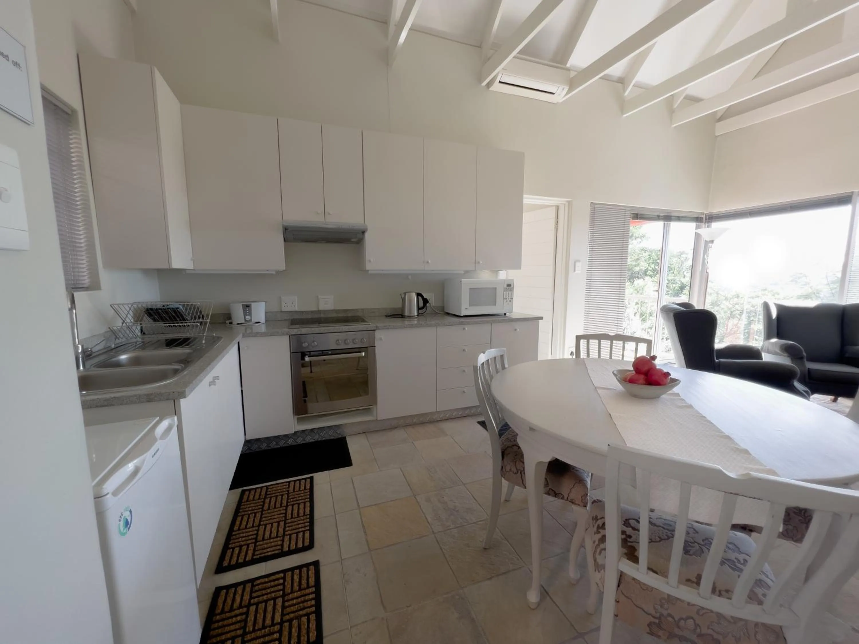 Kitchen or kitchenette in Orangerie Guest House