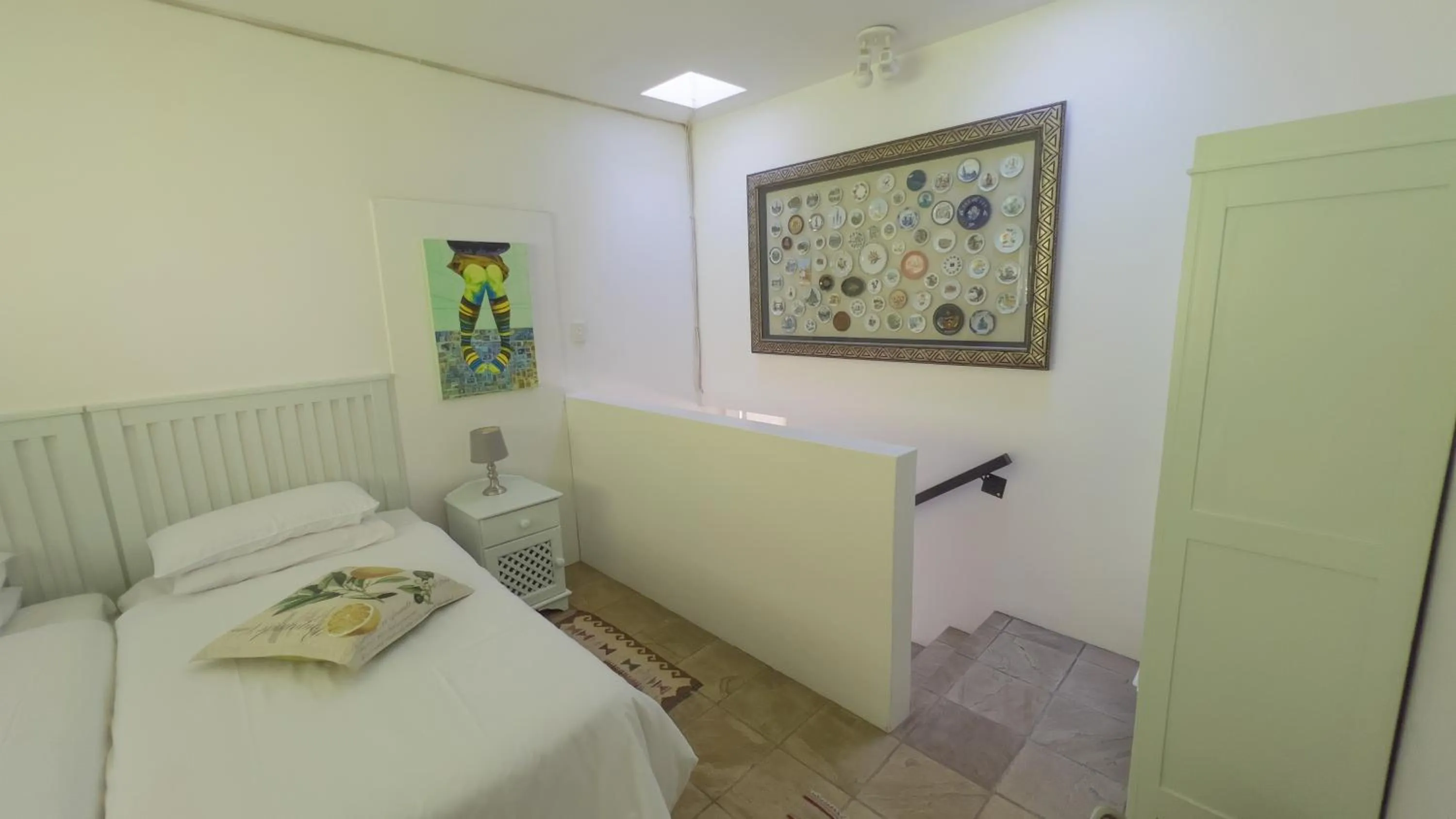 Bed in Orangerie Guest House