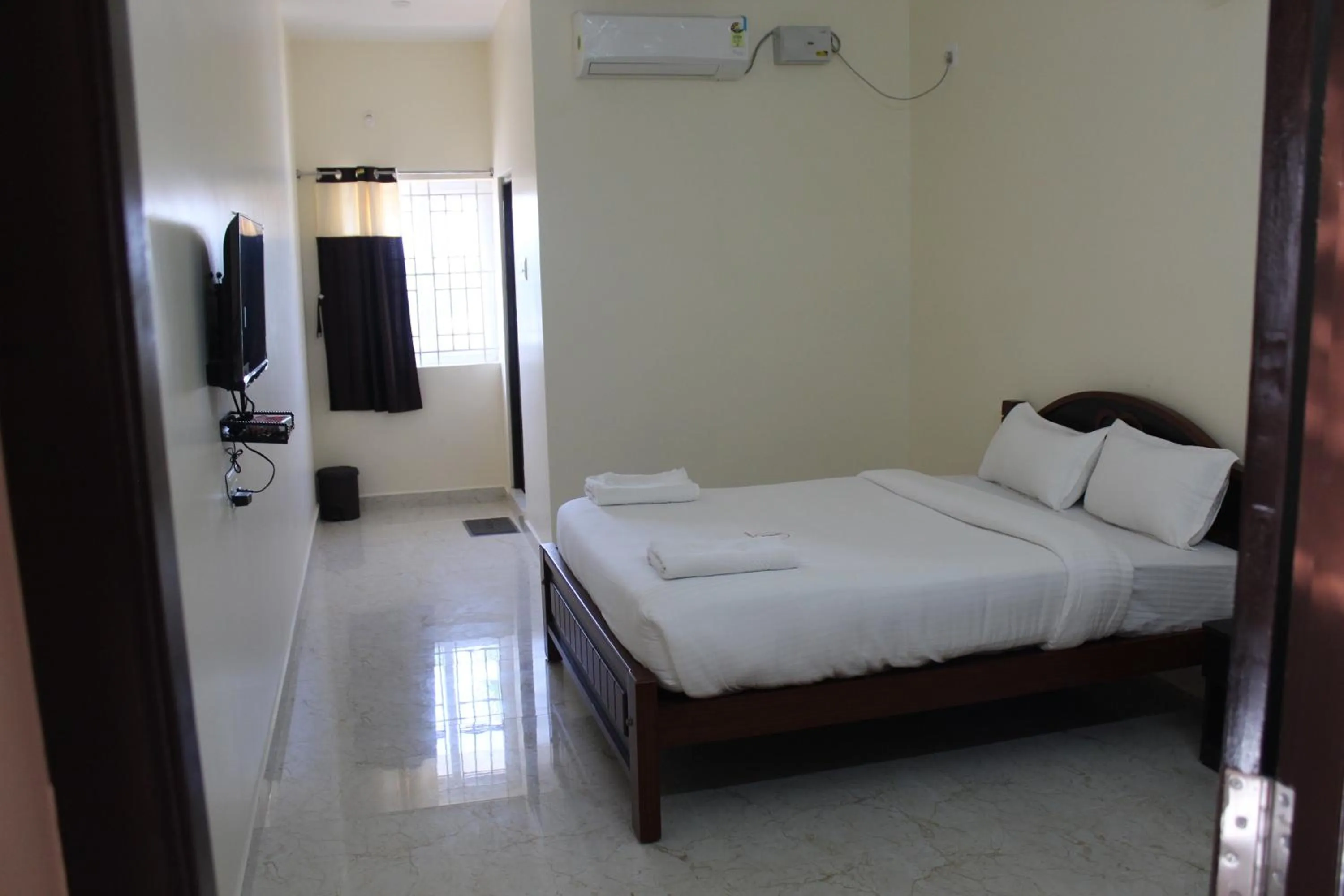 Bed in Kumaran Residency