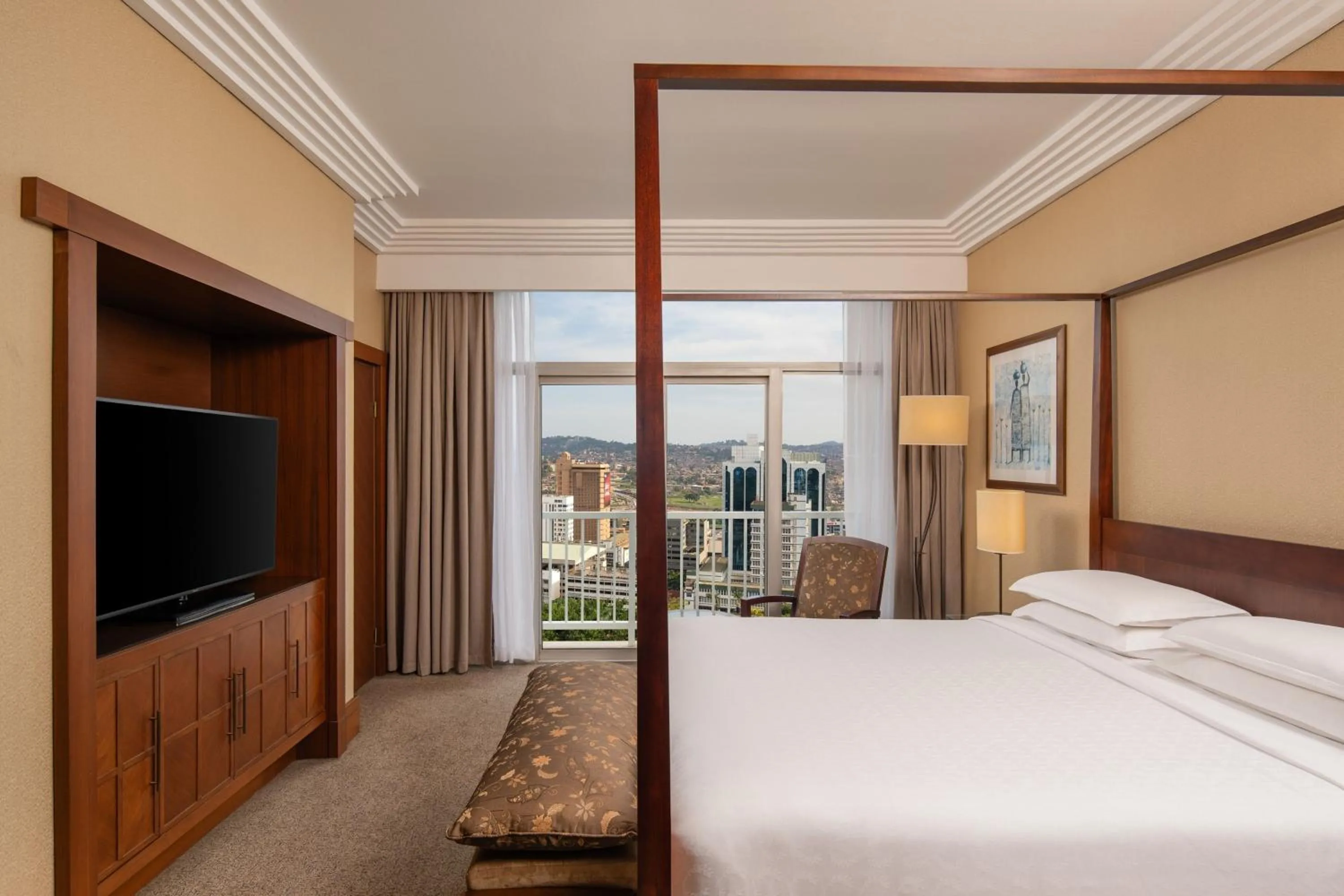 Photo of the whole room, Bed in Sheraton Kampala Hotel