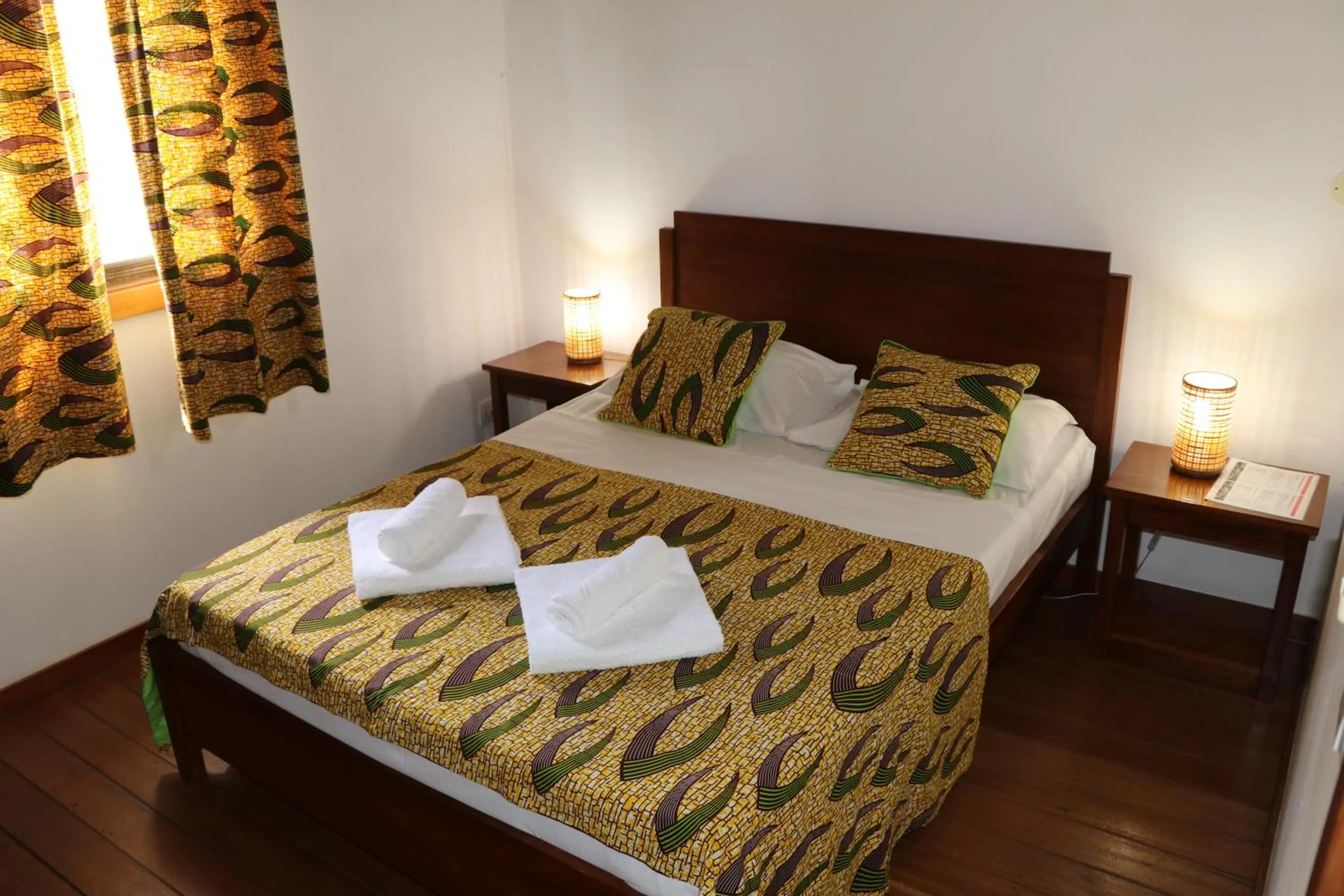 Bed in Sweet Guest House