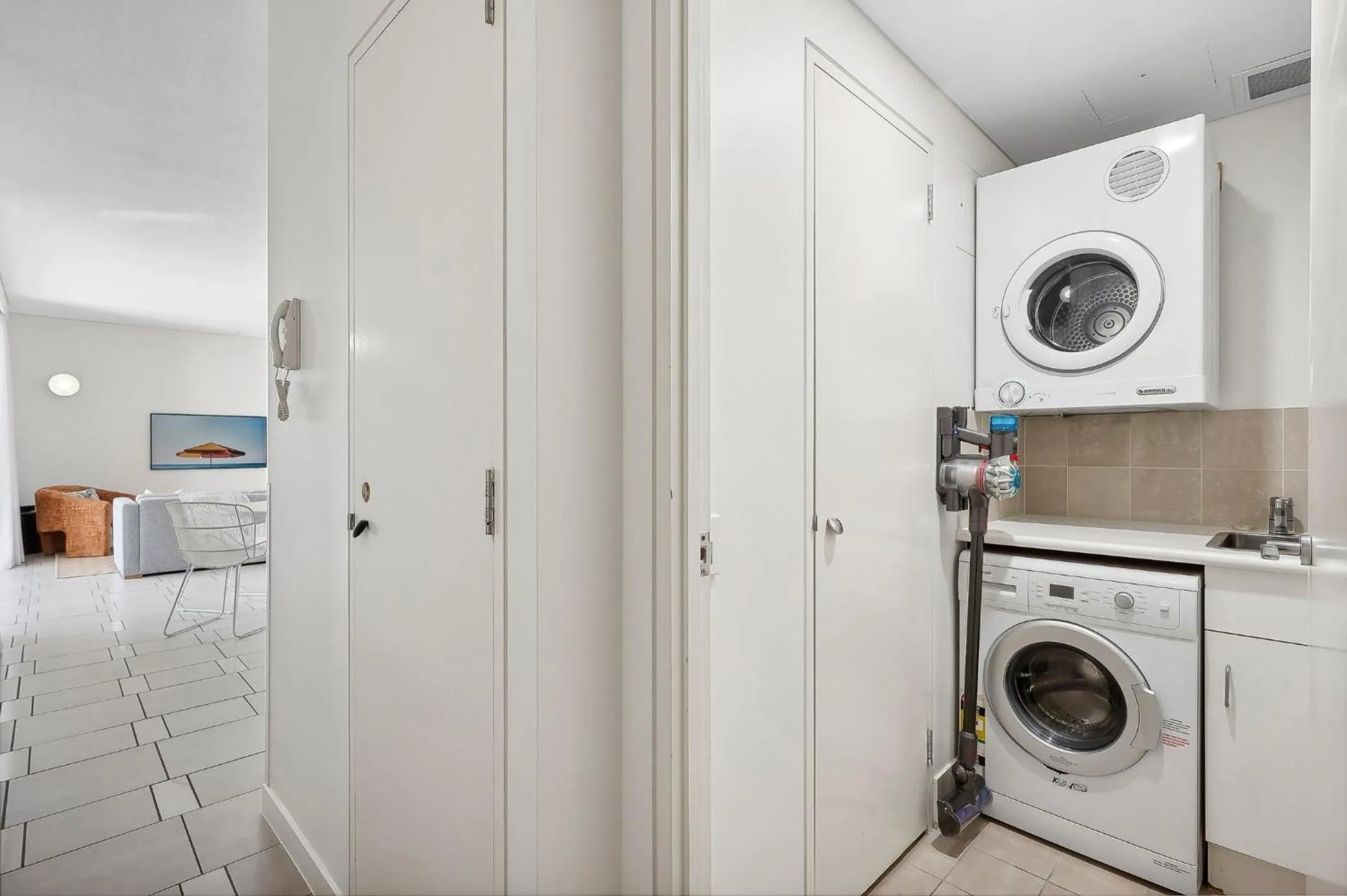 washing machine in Hastings Suites by Stay Noosa