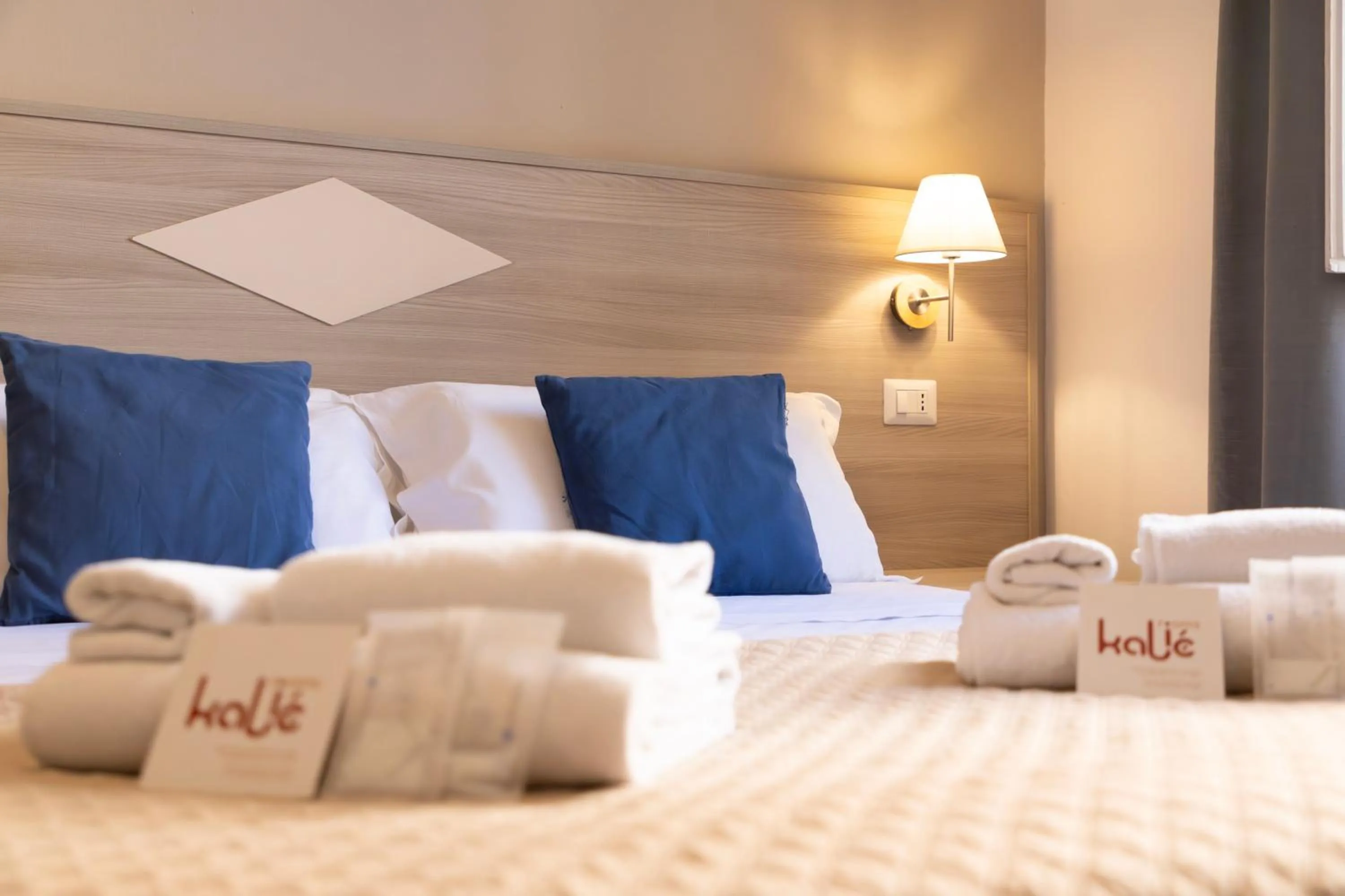 Bed in Kaliè Rooms Guest House