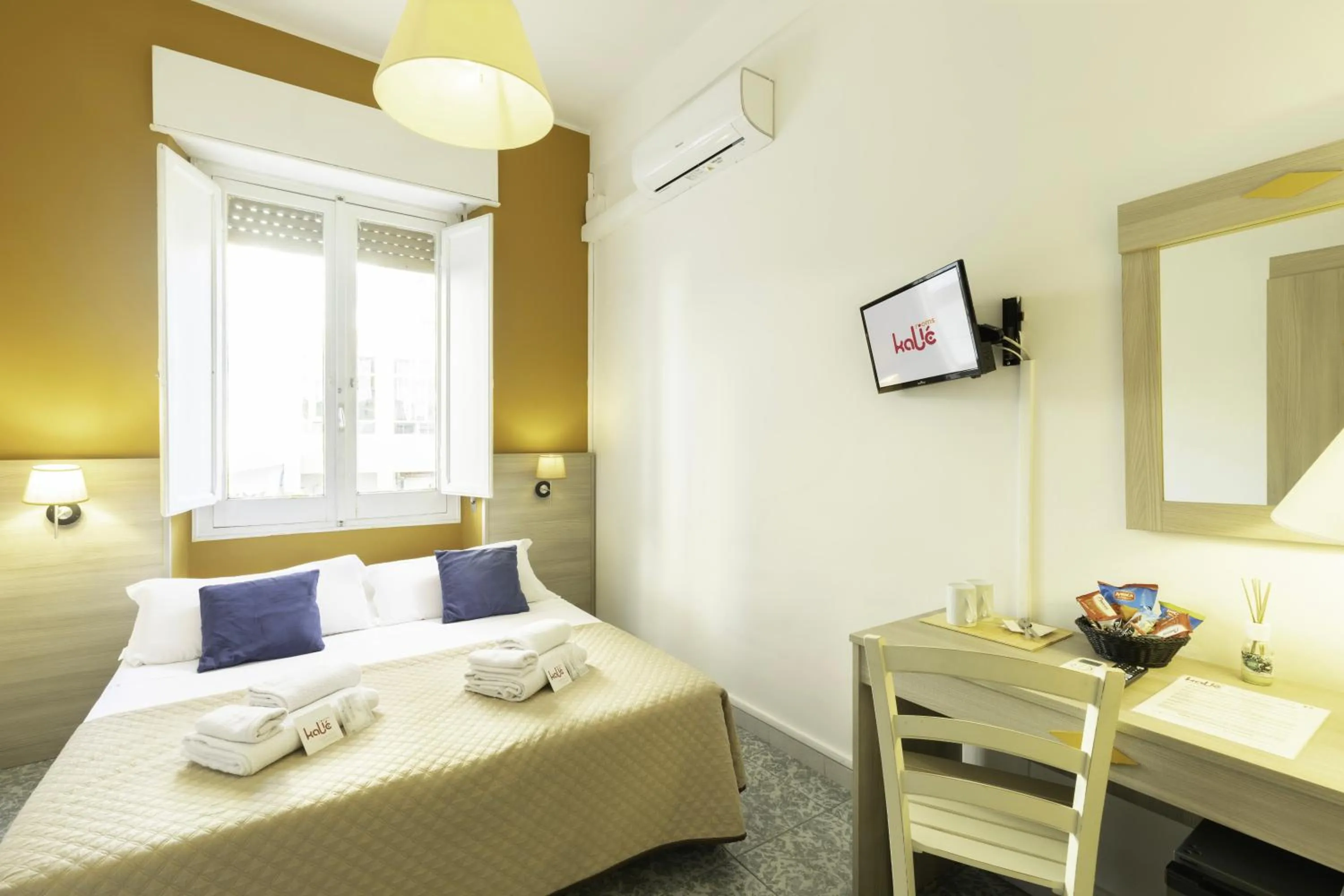 Bed in Kaliè Rooms Guest House