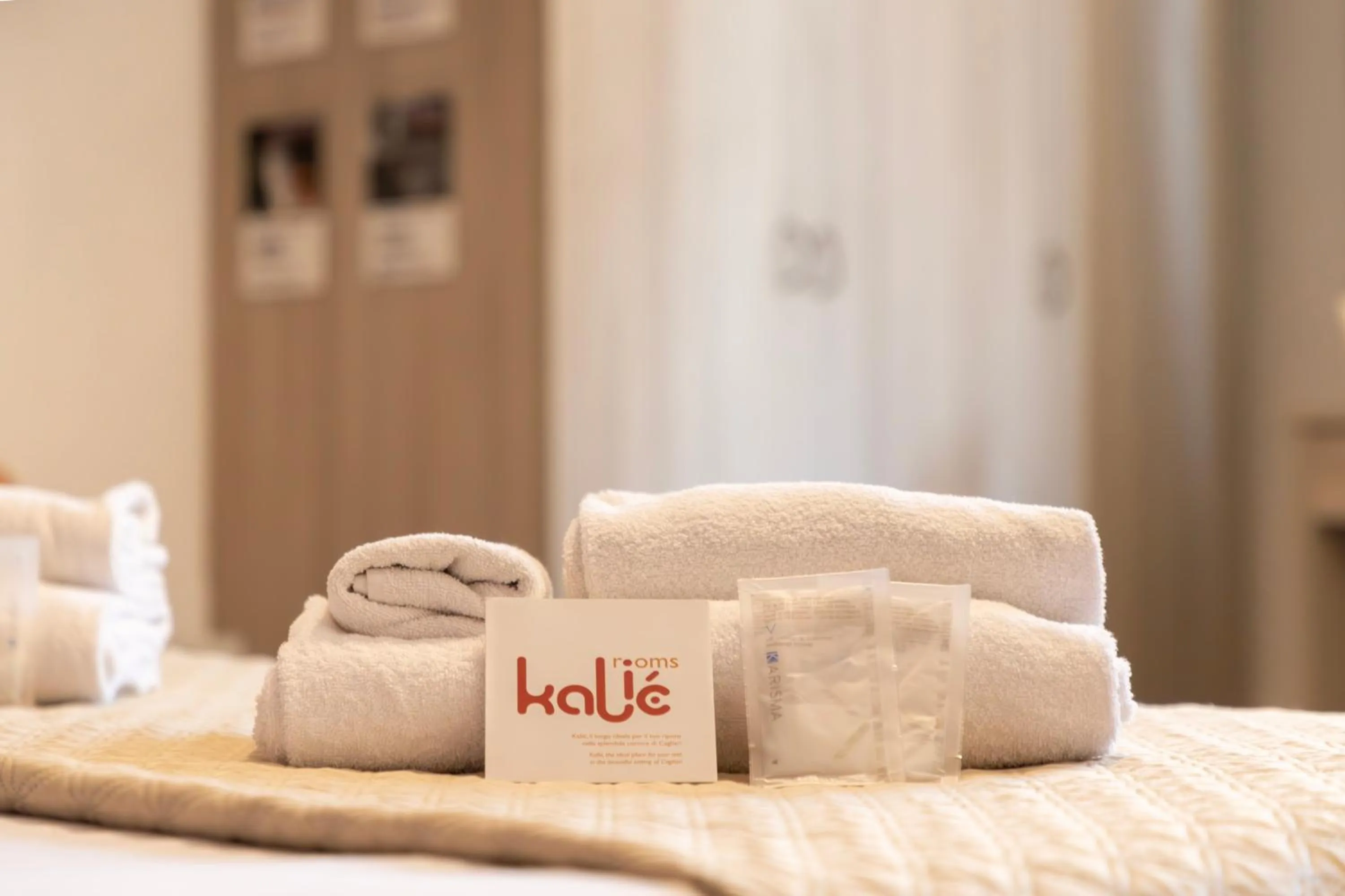 Bed in Kaliè Rooms Guest House