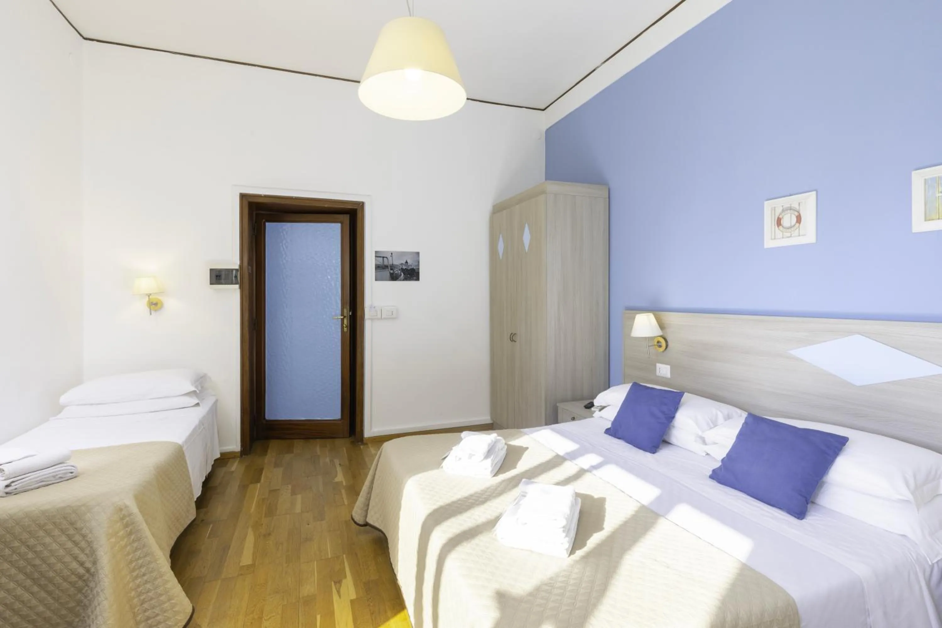 Bed in Kaliè Rooms Guest House