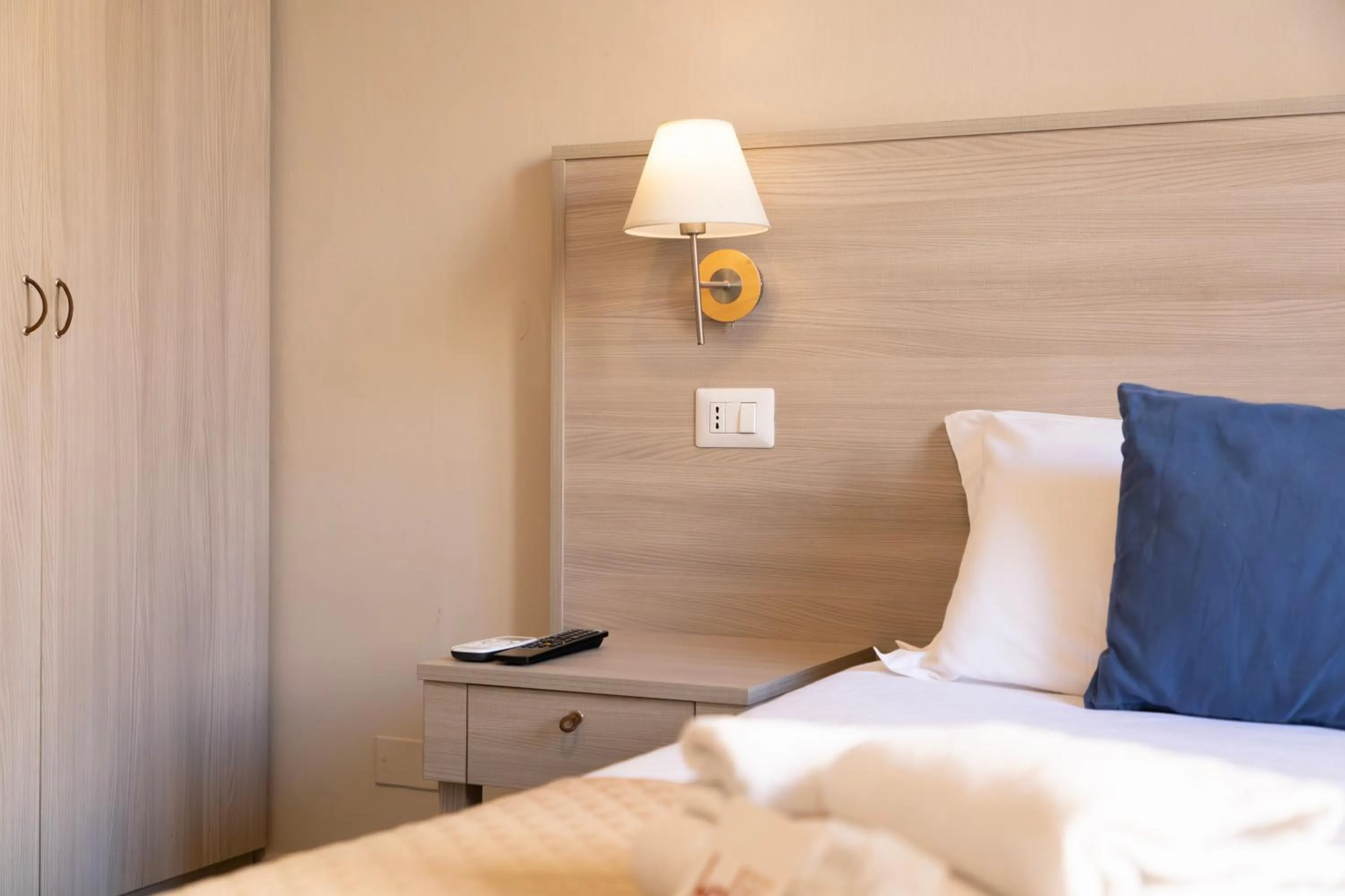 Bed in Kaliè Rooms Guest House