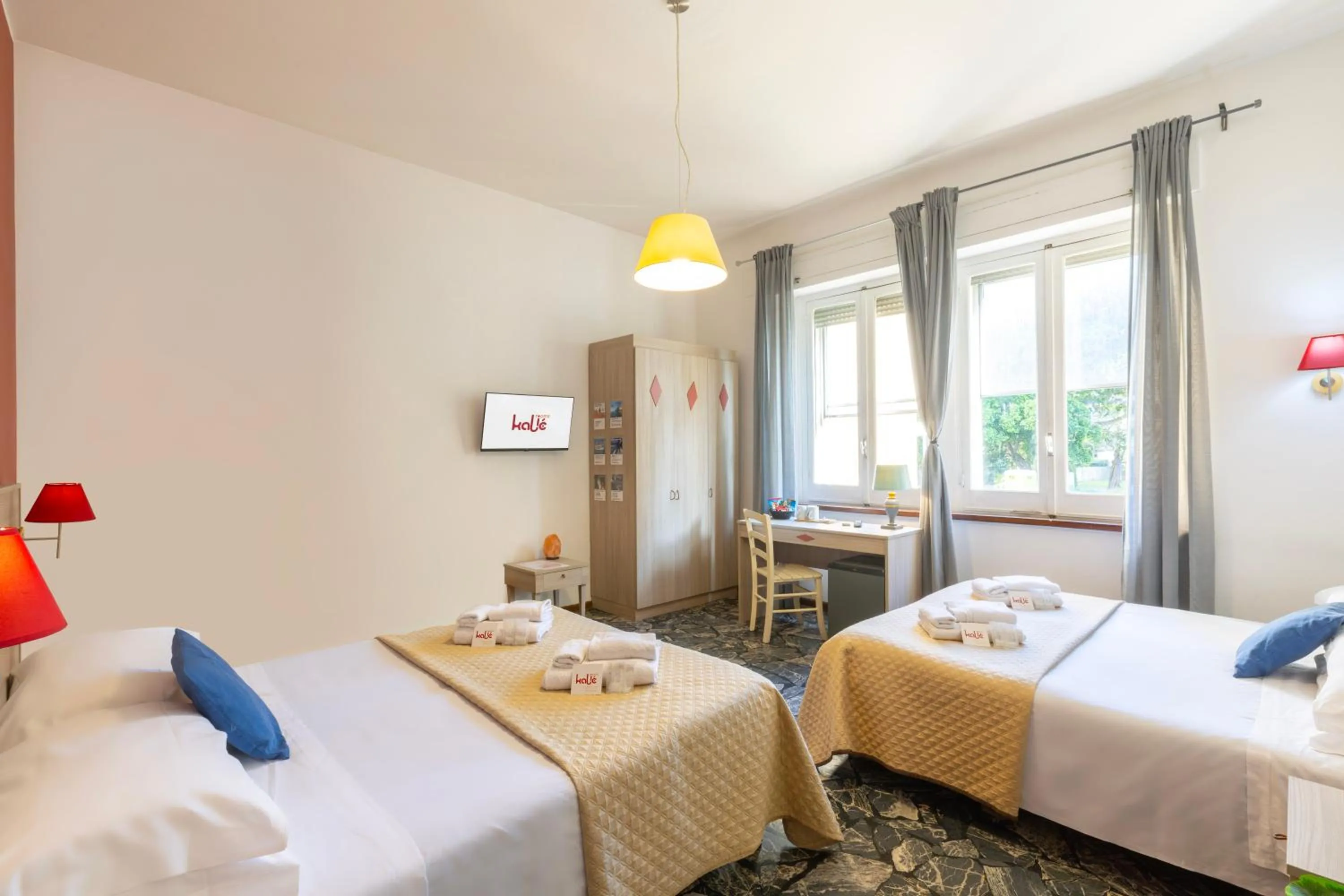 Bed in Kaliè Rooms Guest House