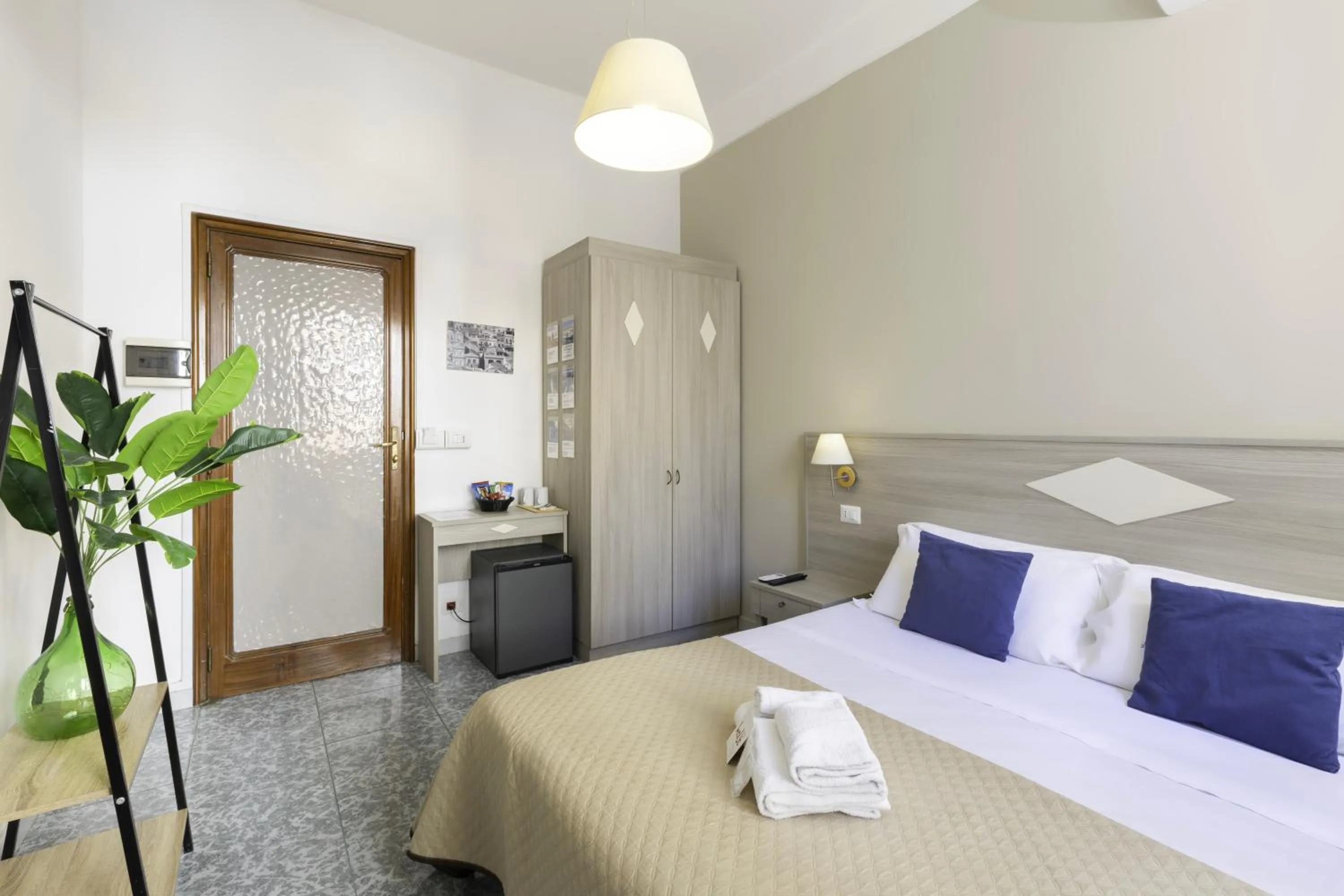 Bed in Kaliè Rooms Guest House