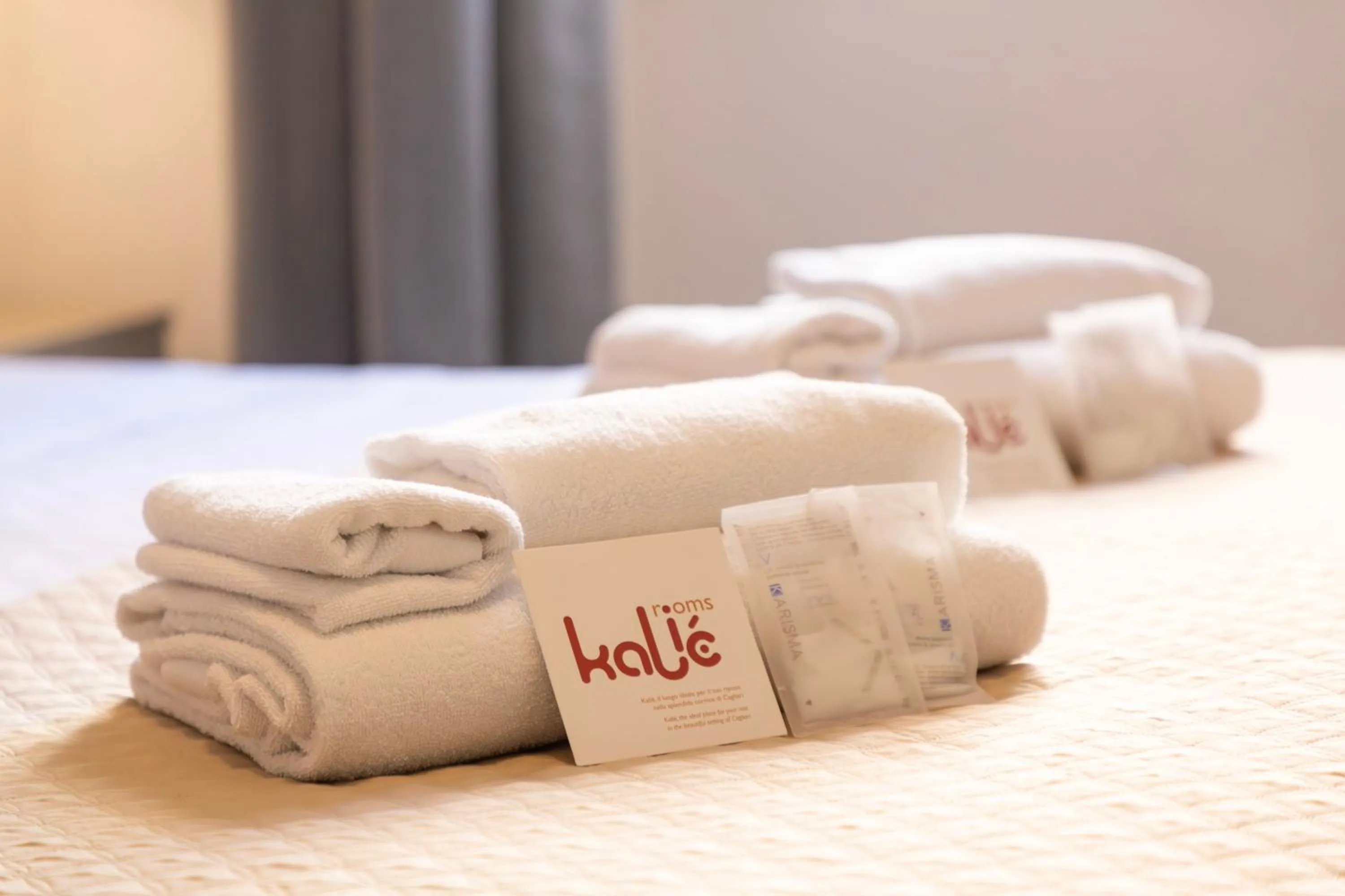 Bed in Kaliè Rooms Guest House