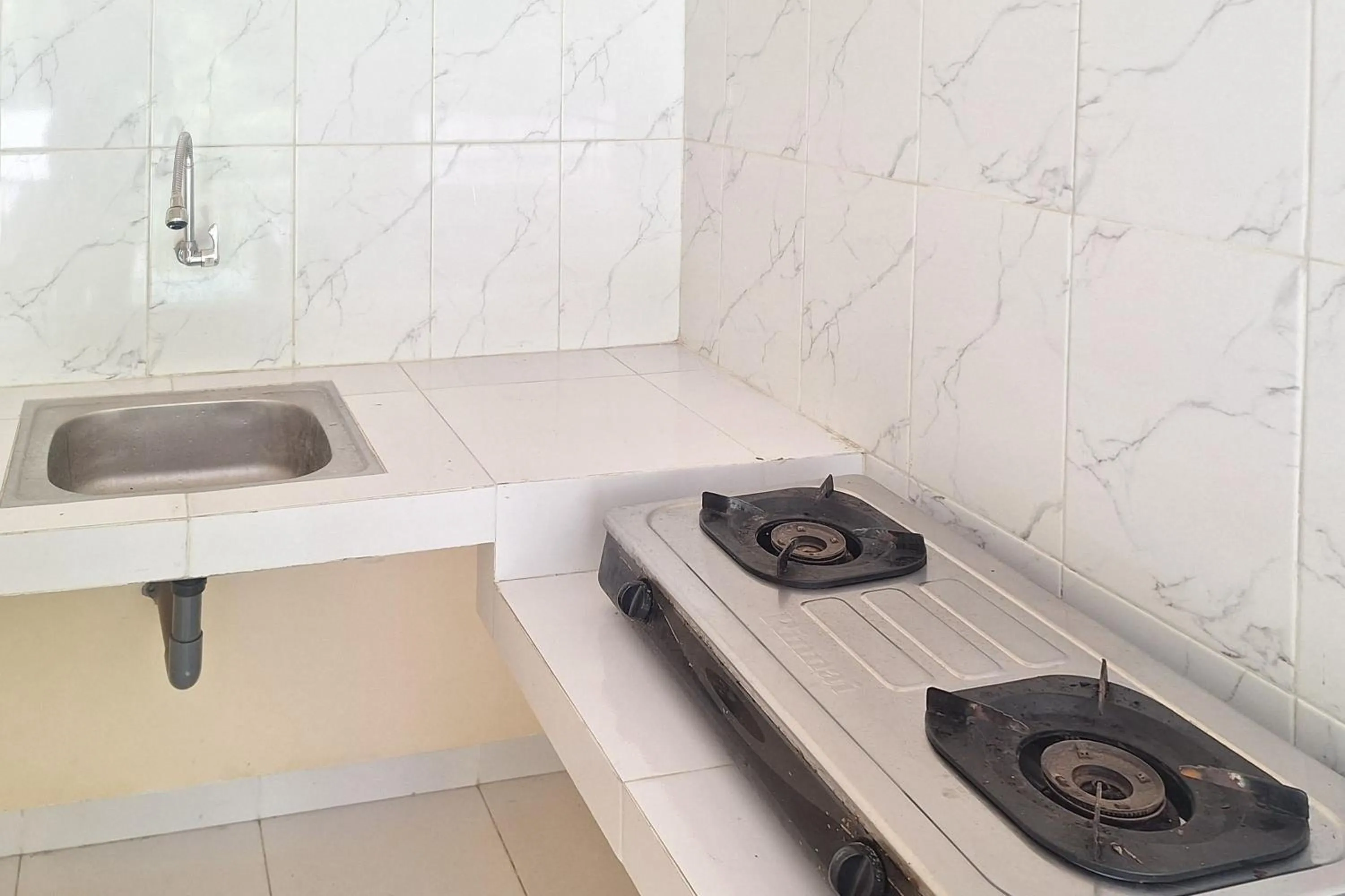 Kitchen or kitchenette in Sendang Syariah RedPartner
