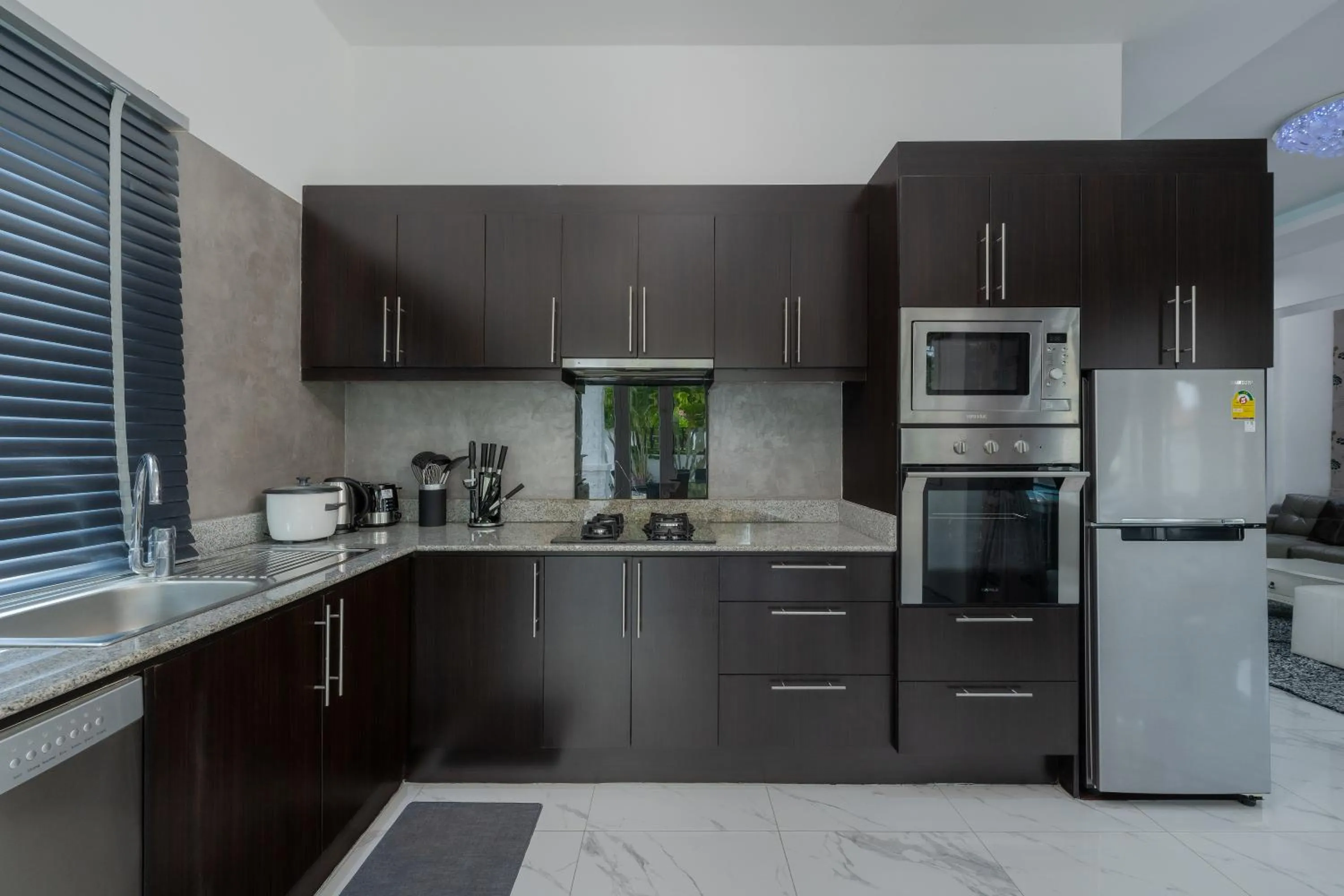 Kitchen or kitchenette in Orchid Paradise Homes OPV 28