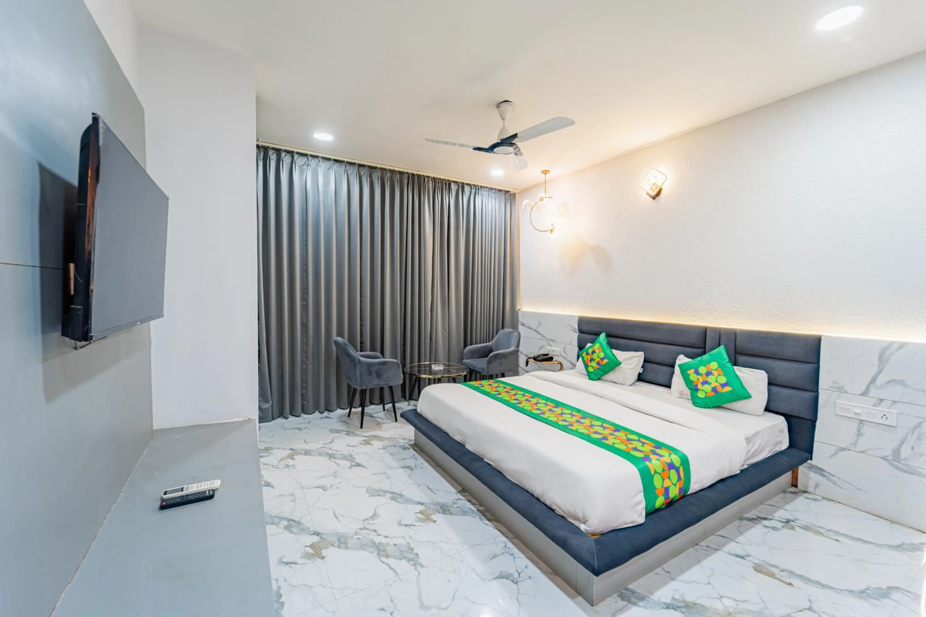 Bedroom, Bed in Treebo Musk