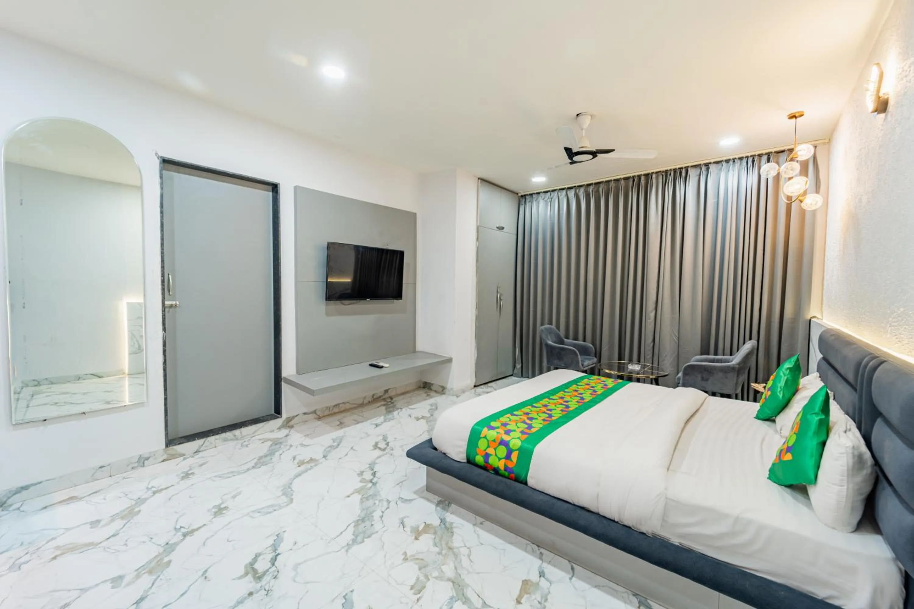 Bedroom, Bed in Treebo Musk