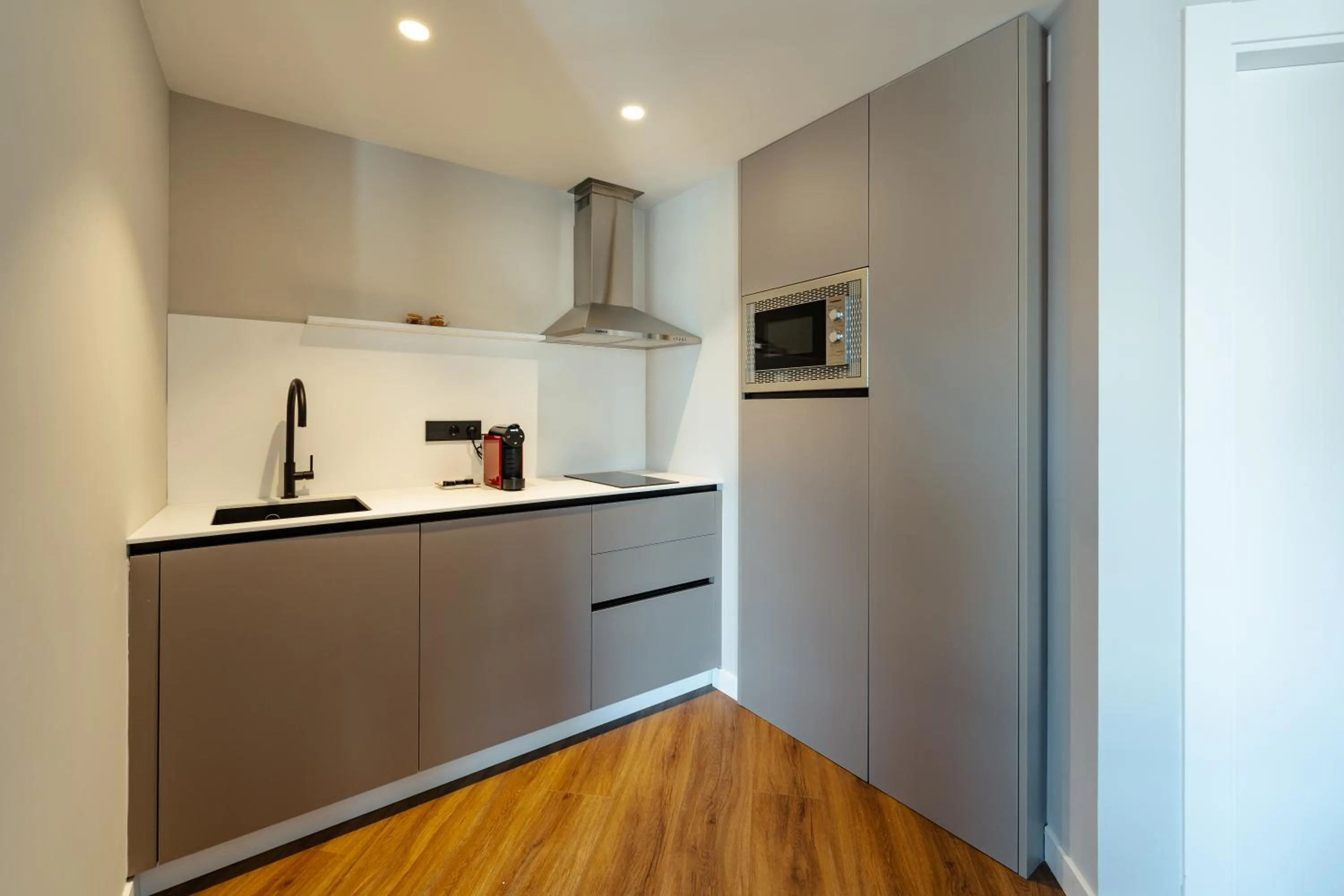 Kitchen or kitchenette in Apartamentos 2H LIVING