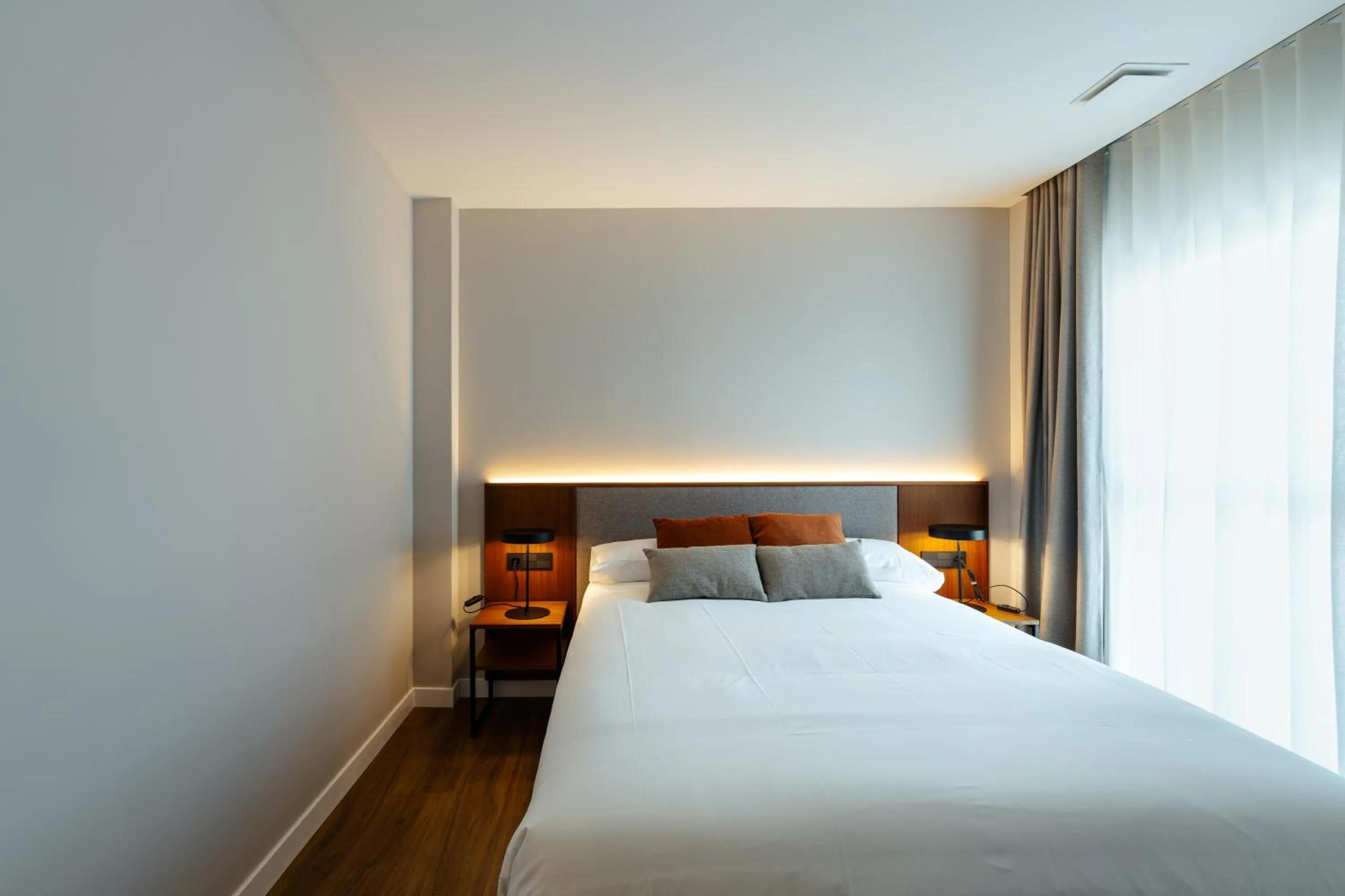 Bed in Apartamentos 2H LIVING