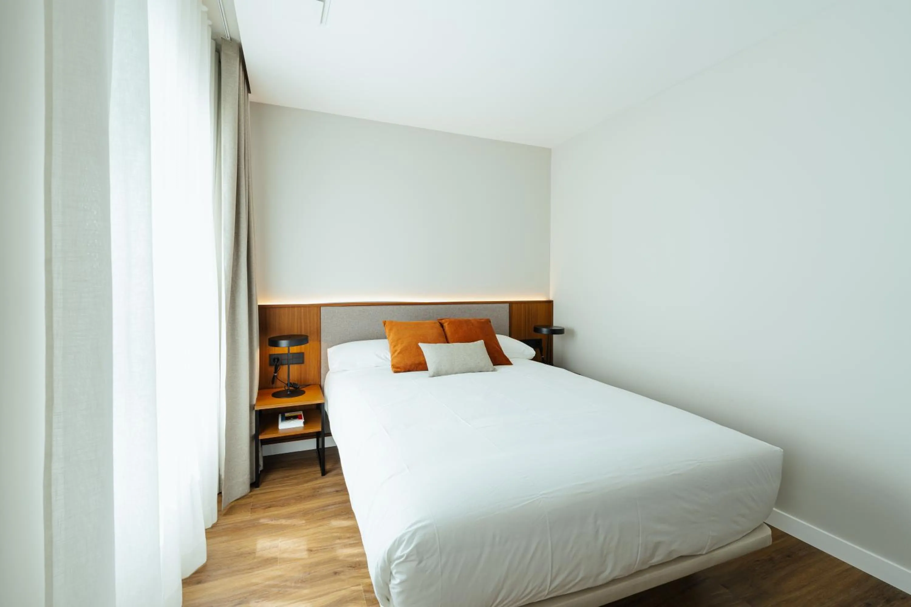 Bed in Apartamentos 2H LIVING